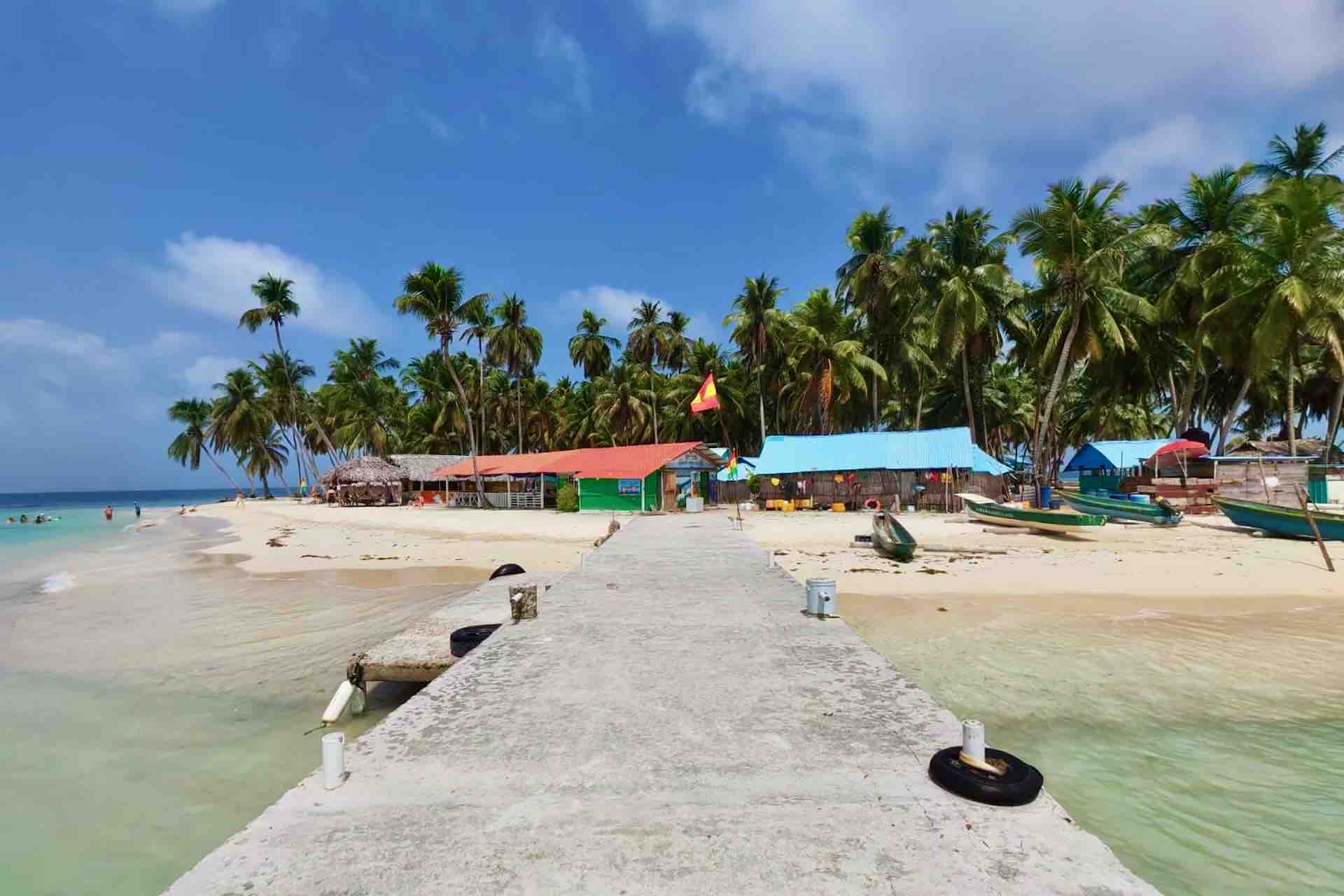 Arrival dock and beach at Isla Aroma in the San Blas Islands, Panama