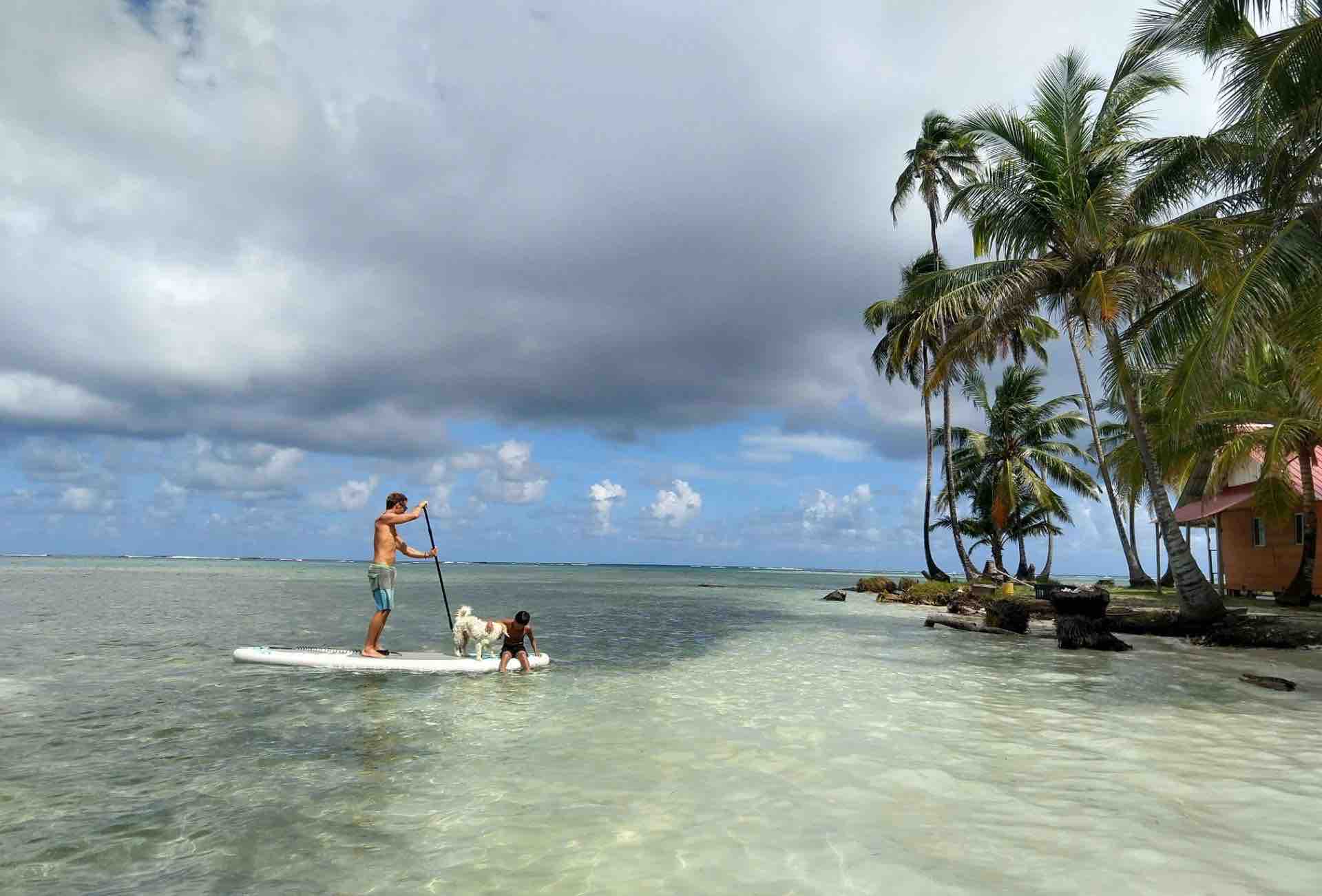 San Blas Isla Yansailadup paddle boarder and beach
