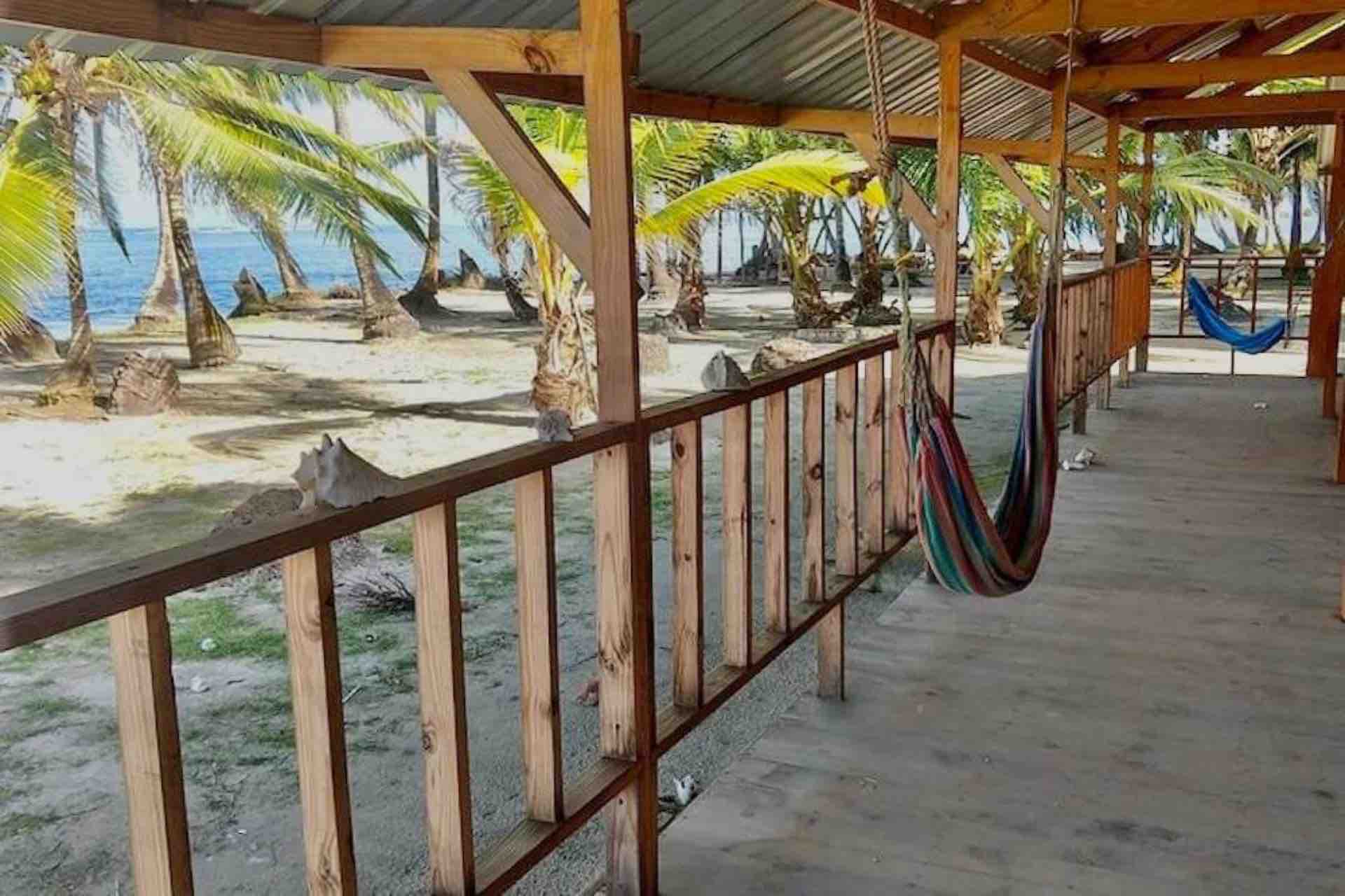 San Blas Panama Isla Yansailadup private rooms building hammocks patio