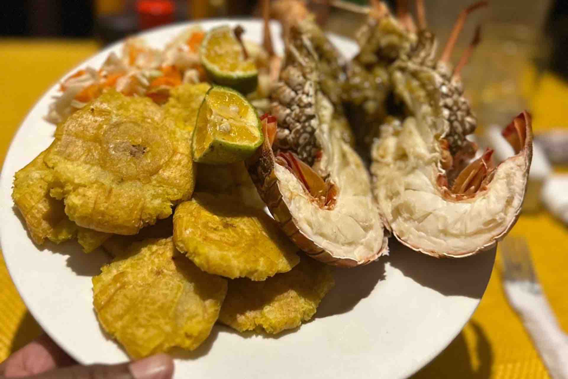 San Blas cabins, narasgandup over water lobster dinner meal