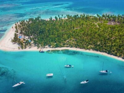 San Blas island drone view of island, turquoise ocean and sailboats