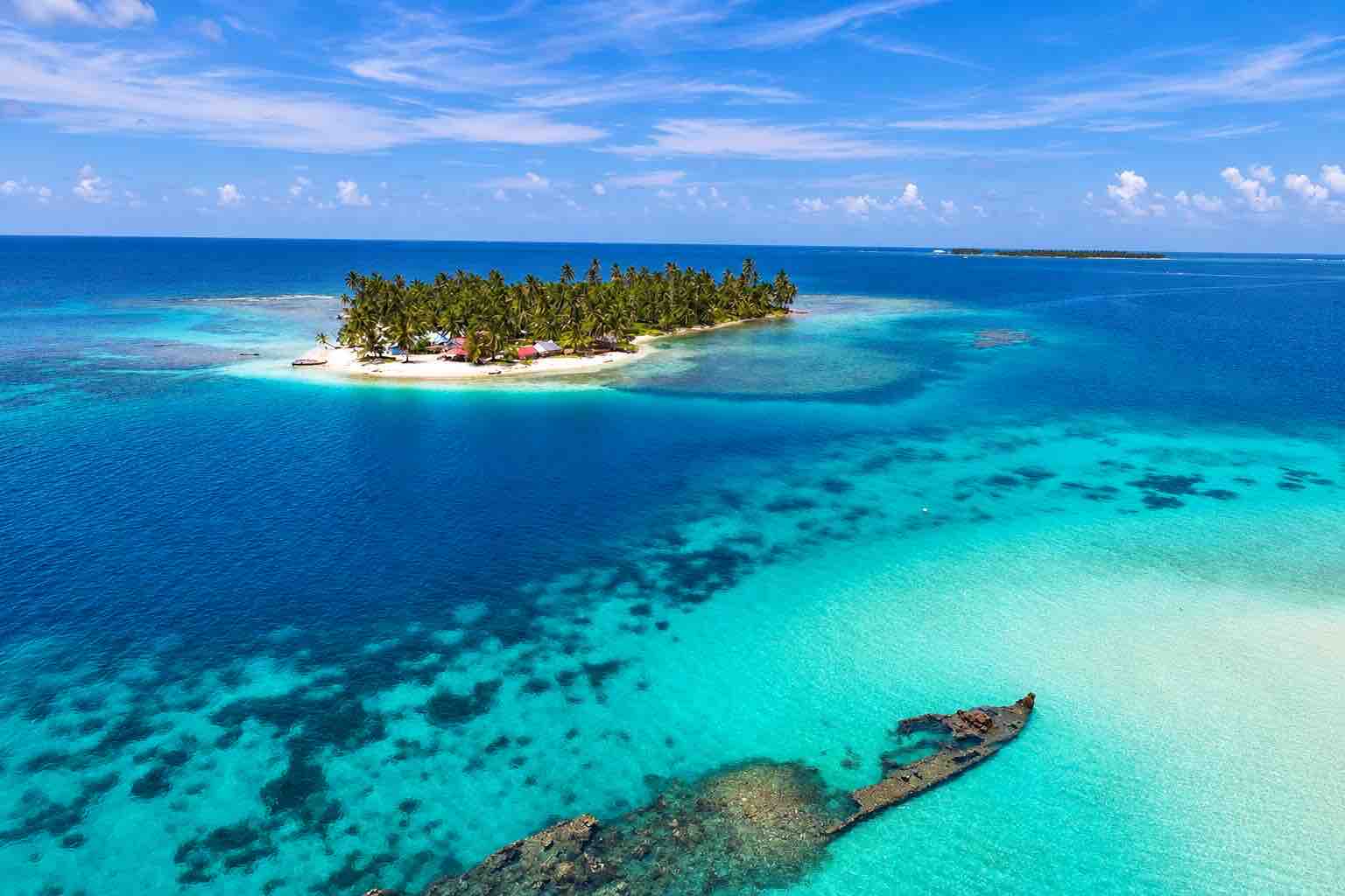 Drone aerial view of Isla Diablo San Blas and surrounding reef