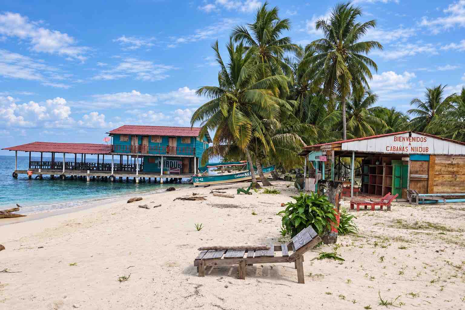 Main house, beach and waterfront dining area on Isla Diablo San Blas