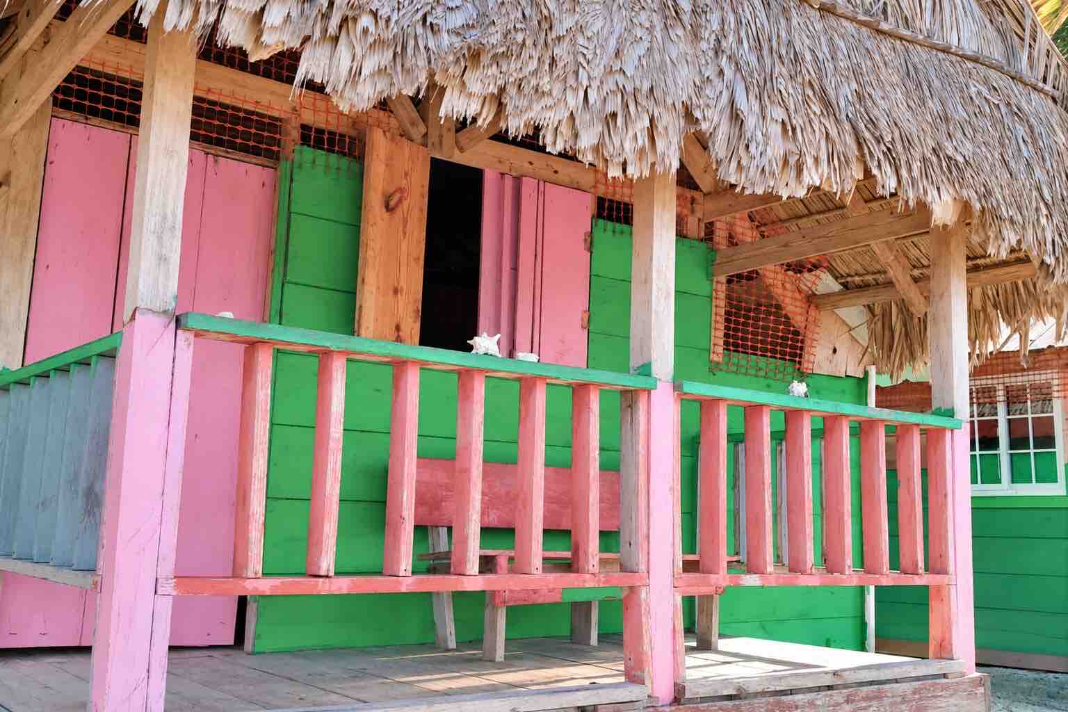 Colorful wooden balcony of an oceanfront cabin on Isla Diablo San Blas