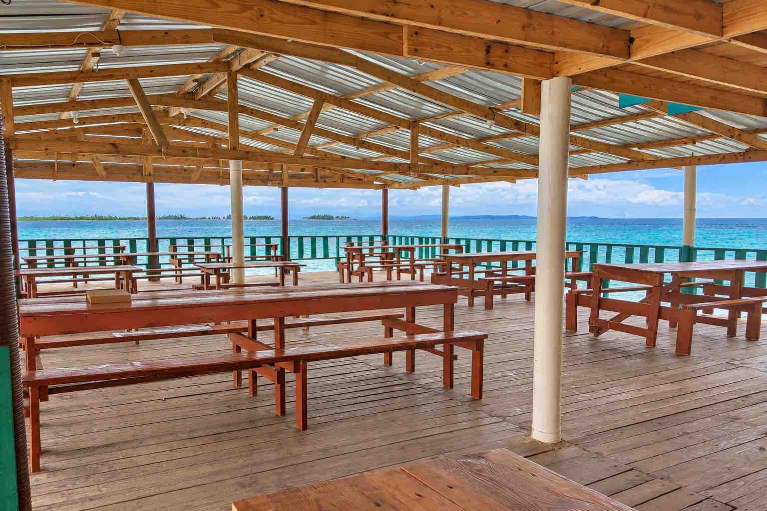 Wooden waterfront dining deck on Isla Diablo San Blas
