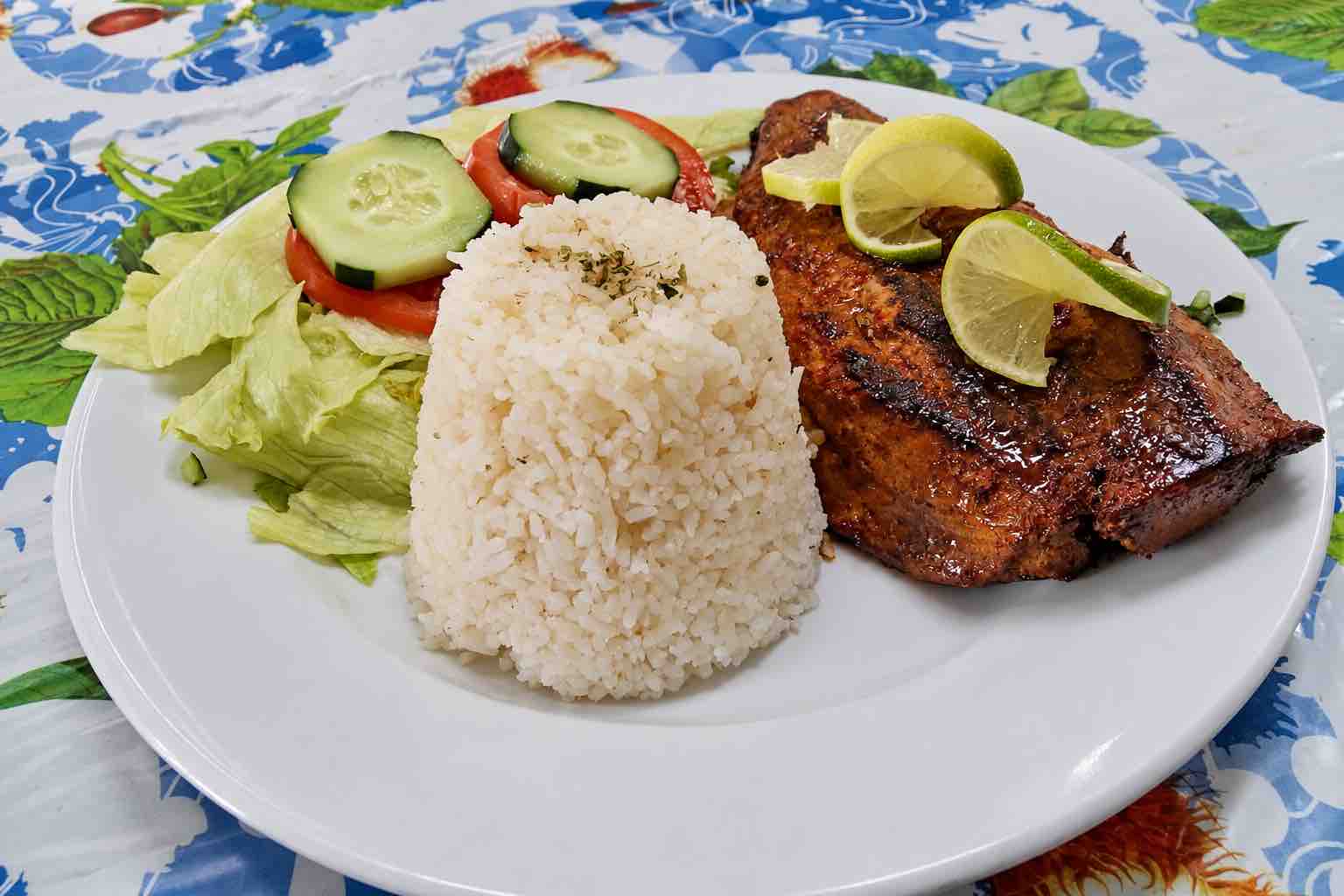 Plate of fish, rice and salad served on Isla Narasgandup