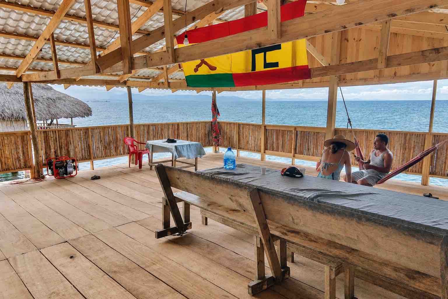 Open-air island restaurant with tables and sea views