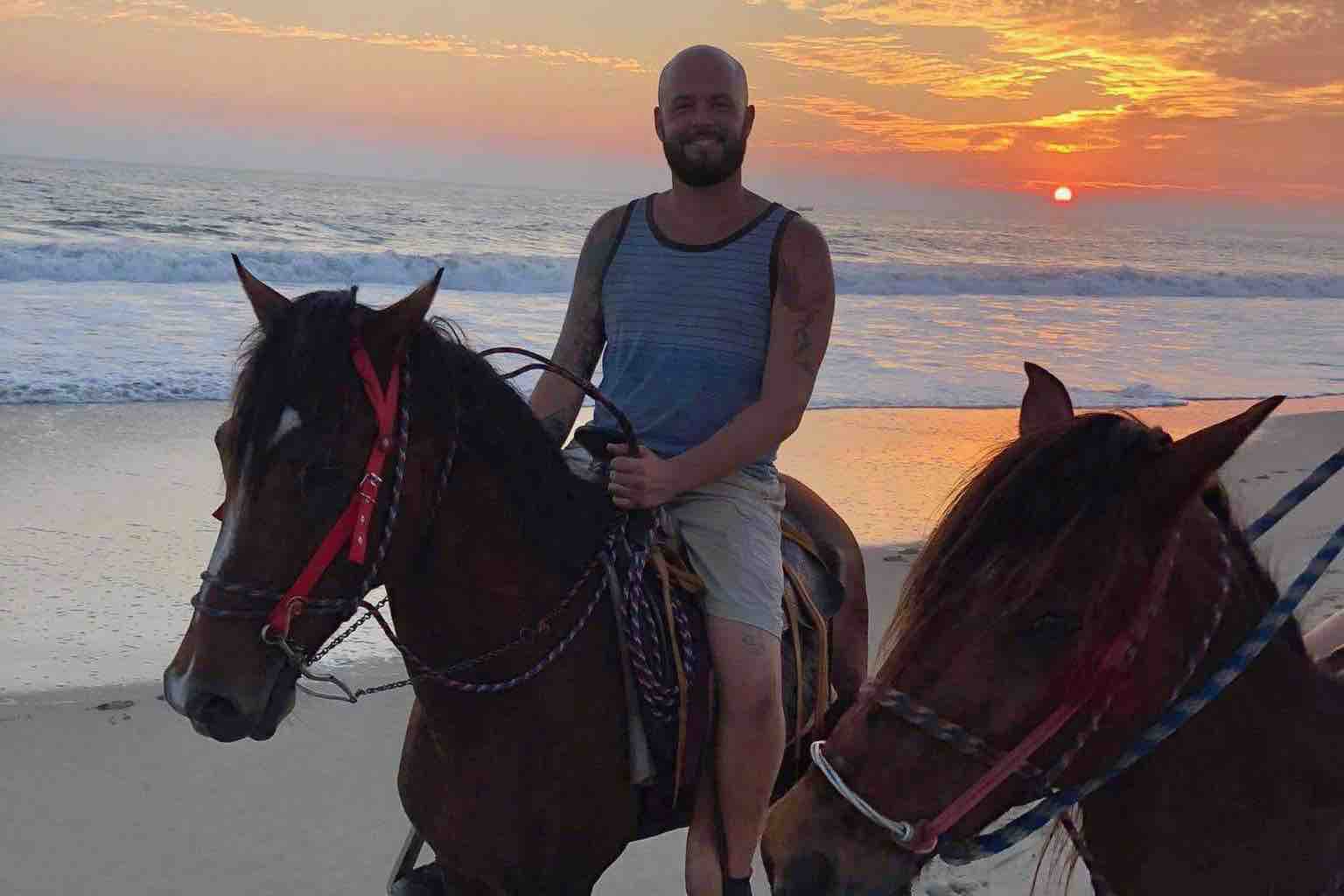 Beach Horseback guest during sunset