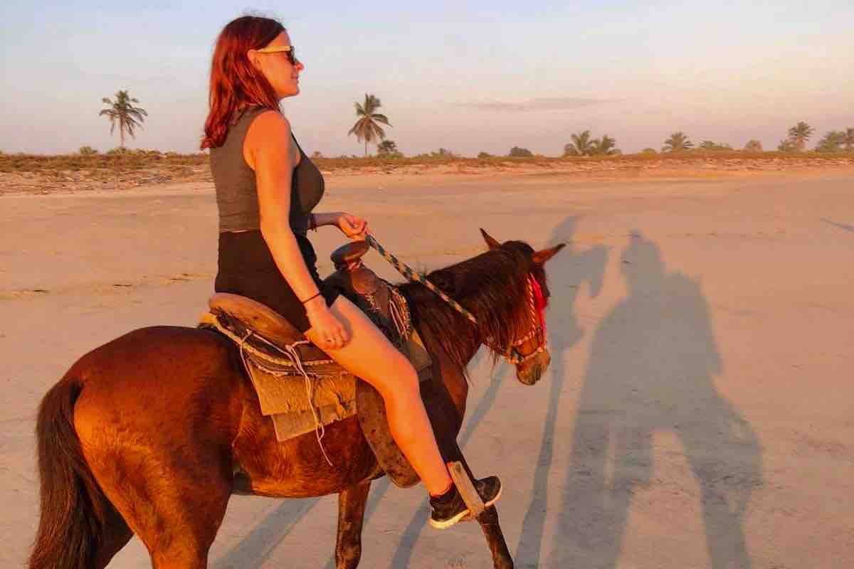 Mexico Beach Horseback woman riding in sunset