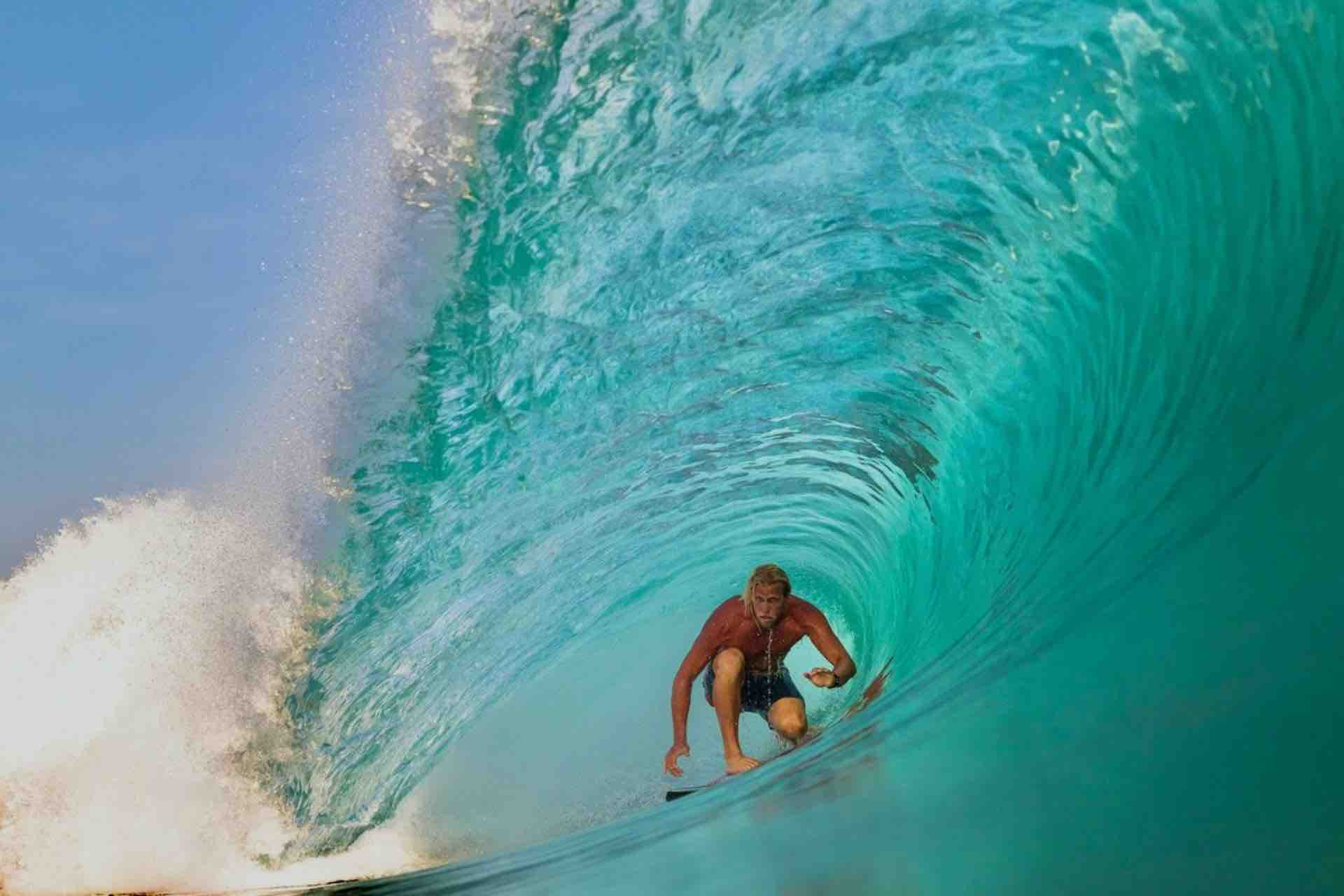 Surfer in wave getting