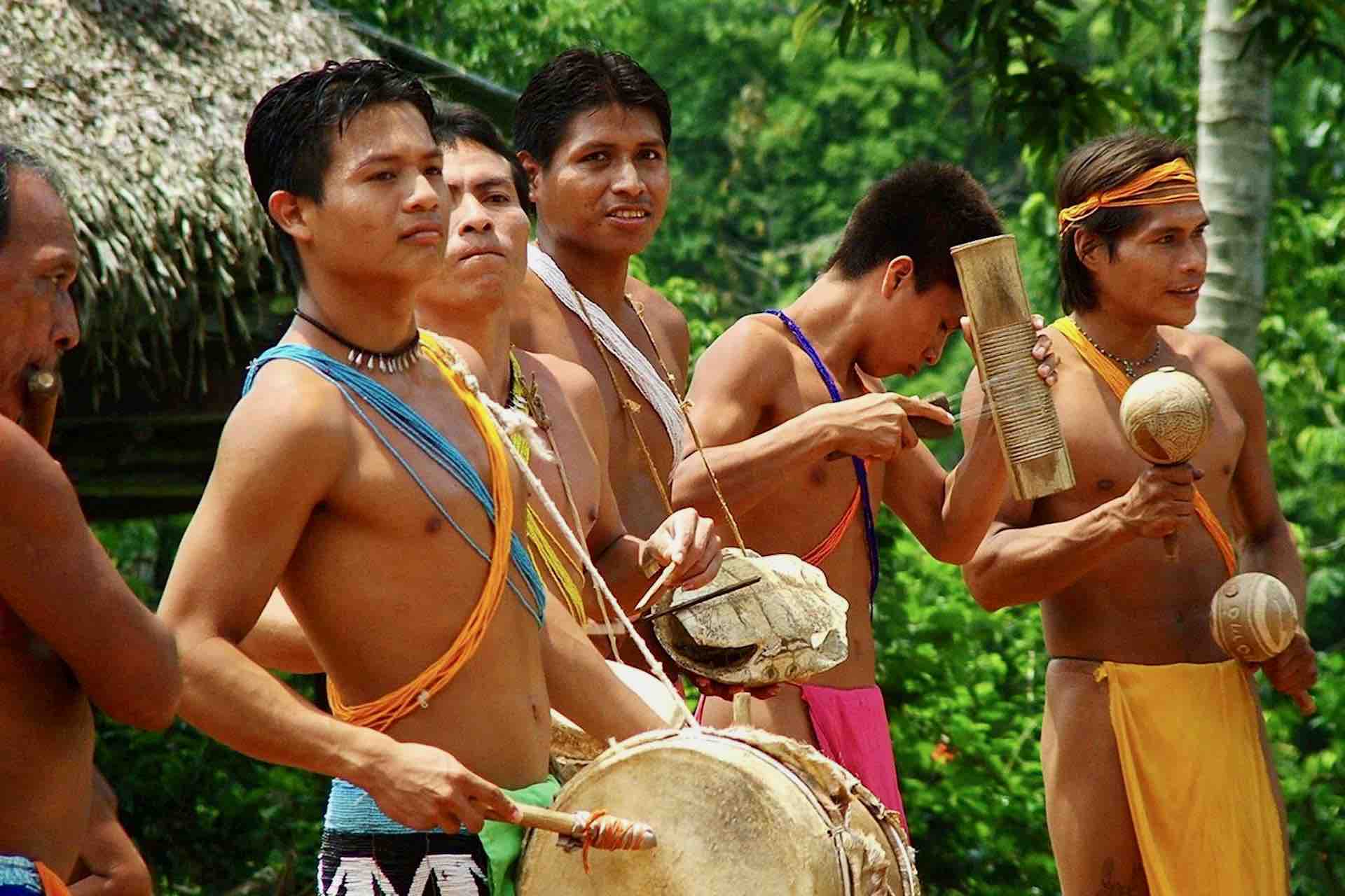Embera Panama Indian Village men playing instruments