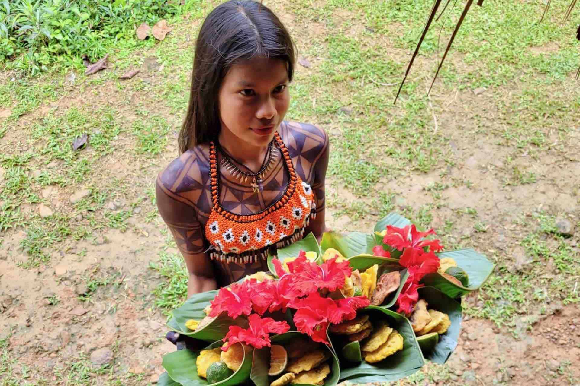 Embera tribe panama tour local woman with traditional lunch panama vacation packages