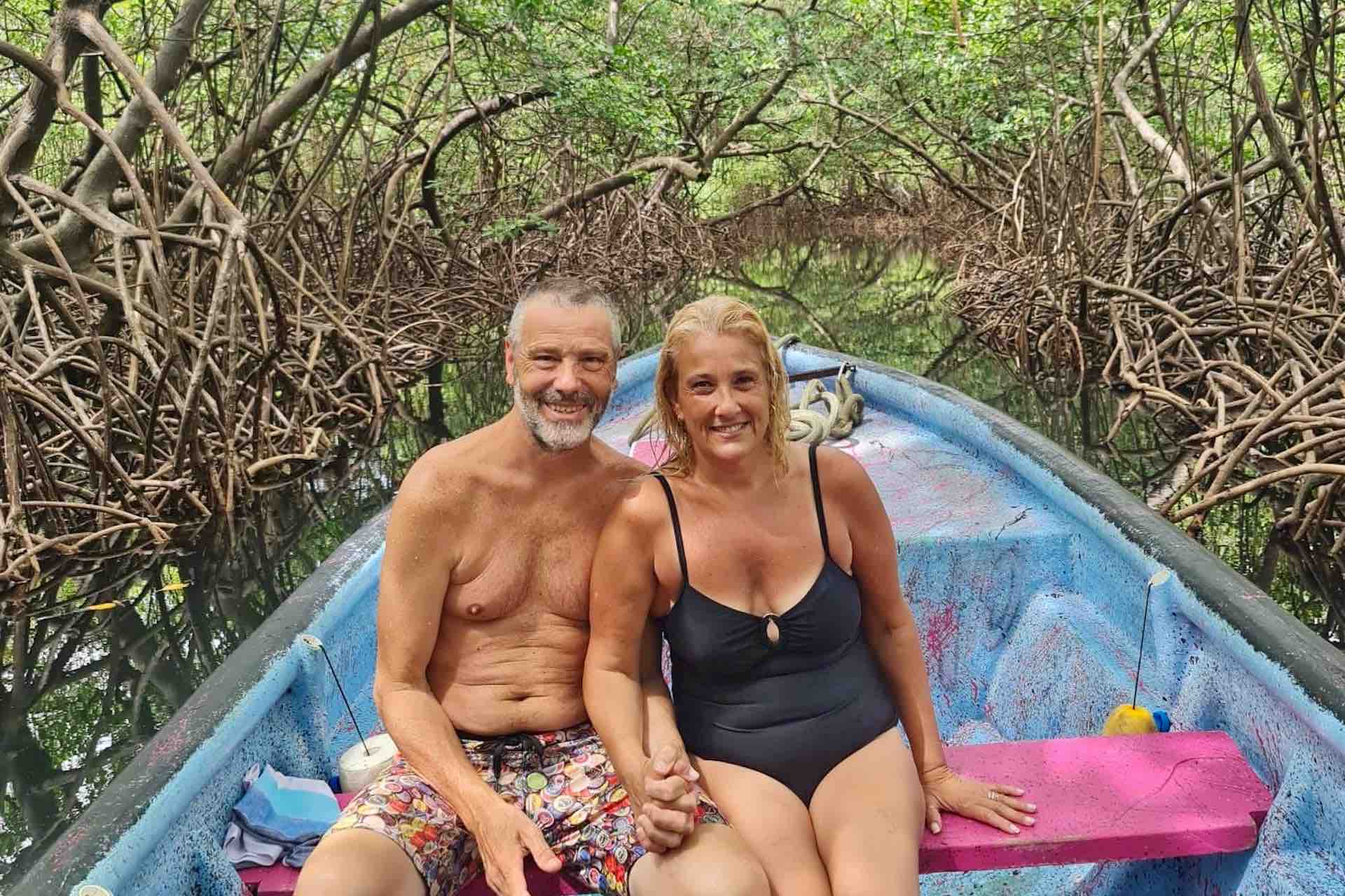 Isla Grande Panama Caribbean Coast Love Tunnel couple in boat photo 1