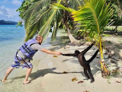 Panama Isla Linton Caribbean Coast guest with monkey 1