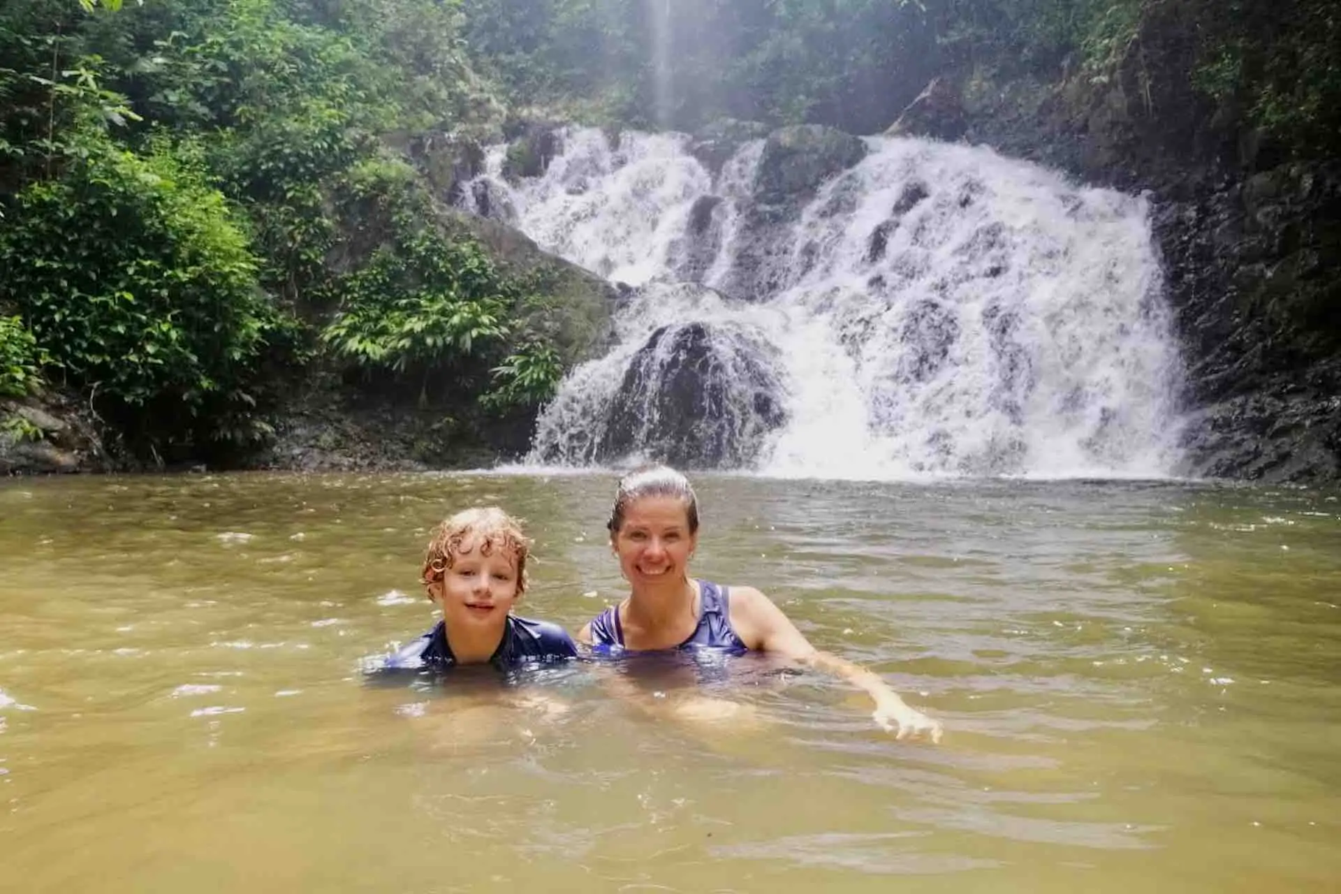 Panama Embera tour waterfall mother and son guests
