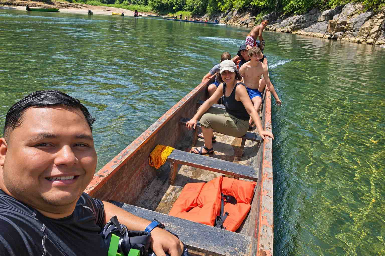 Embera Village Tour – Chagres River Canoe Ride Guests traveling by traditional canoe during an Embera village tour on the Chagres River