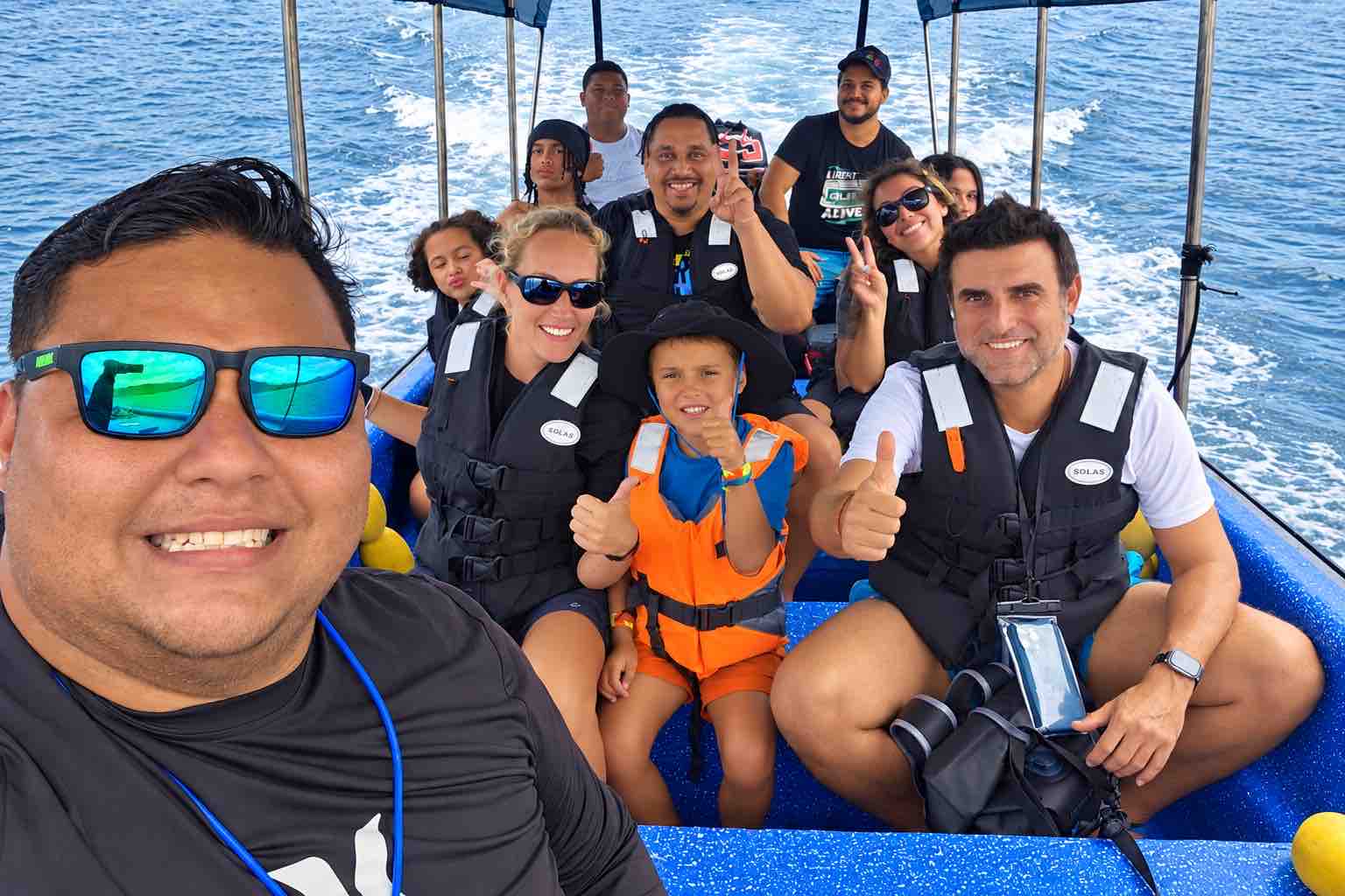 Travelers wearing life jackets on a Monkey Island boat tour Panama
