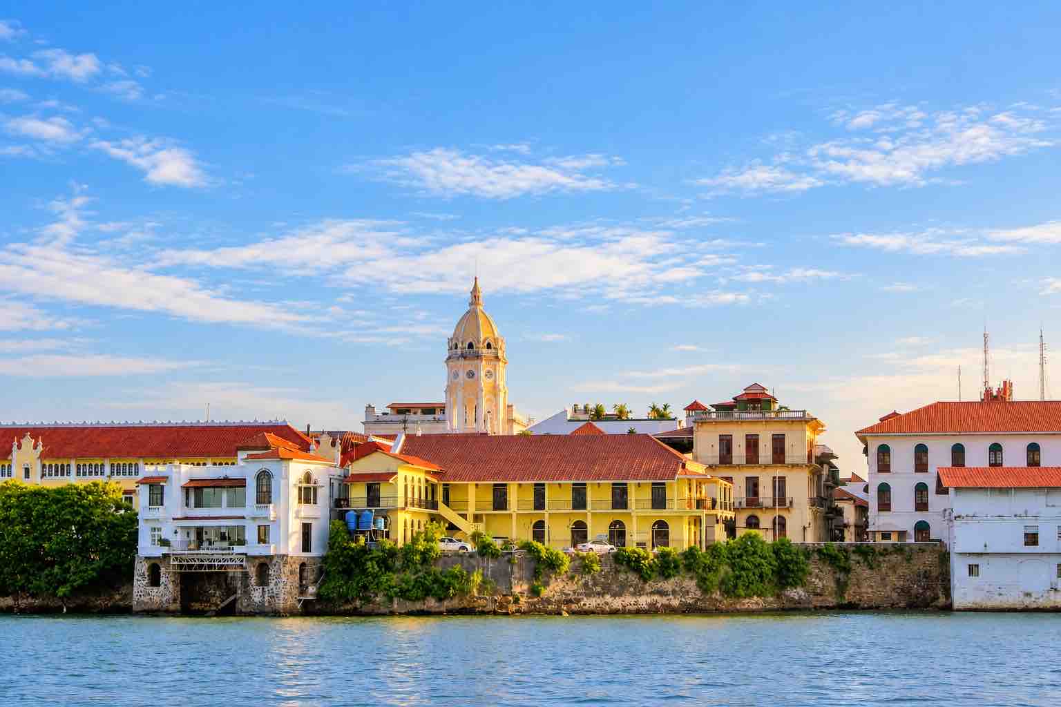 Panama Canal and City Tour: colorful historic buildings along the Casco Antiguo waterfront.