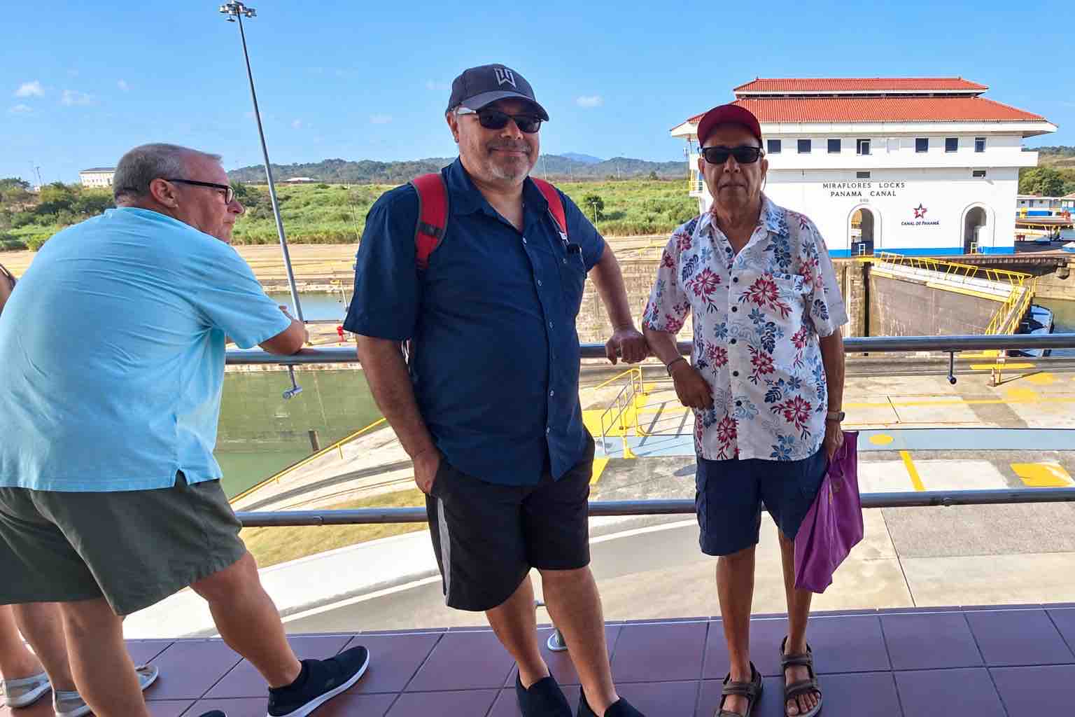 Panama Canal and City Tour: tour guests beside the viewing railing at Miraflores Locks.