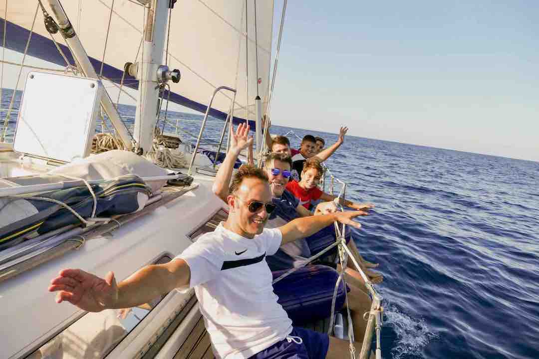 Maverick sailboat guests enjoying sailing