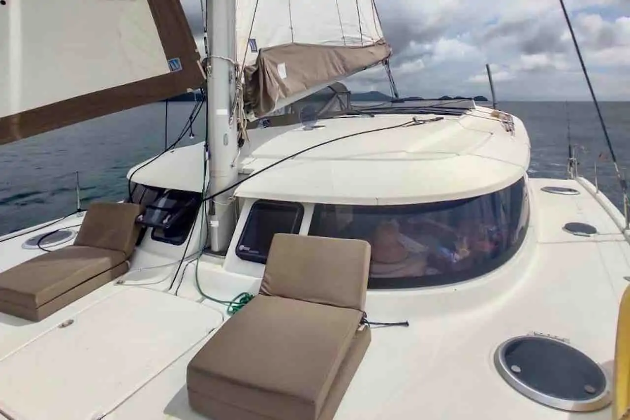 Atila catamaran outside deck with lounge chairs