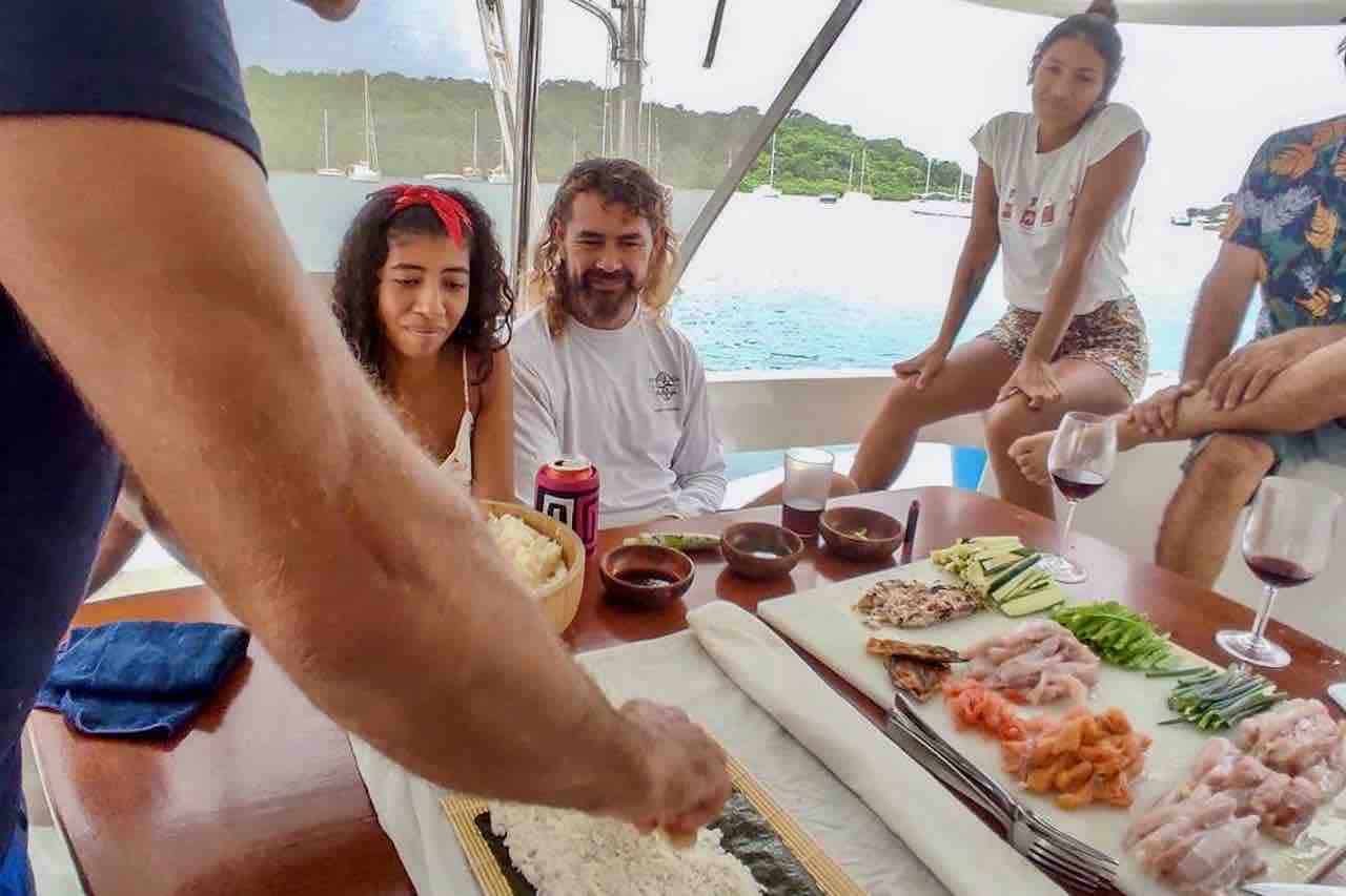 Atila catamaran guests eating