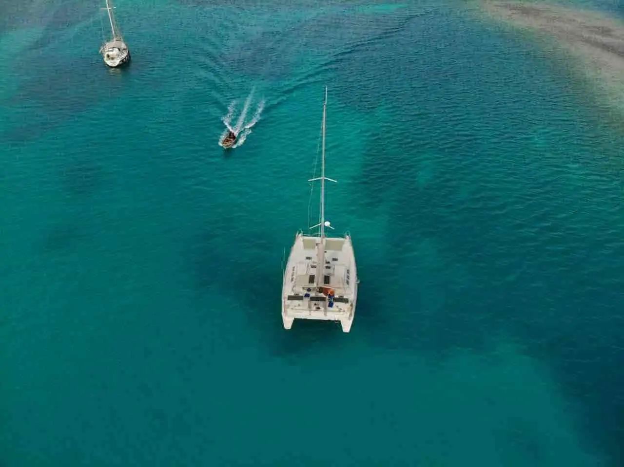 Drone view of Custom catamaran at anchor in San Blas island