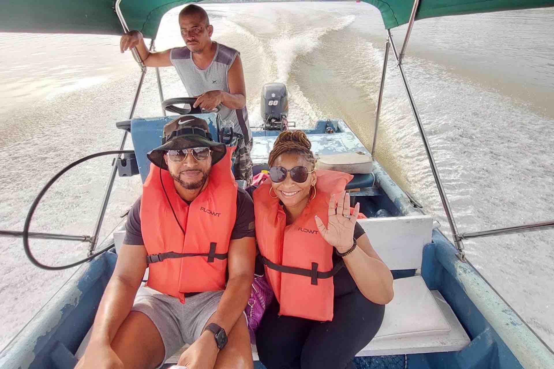 monkey island panama sloth sanctuary tour guests in speedboat rio chagres river