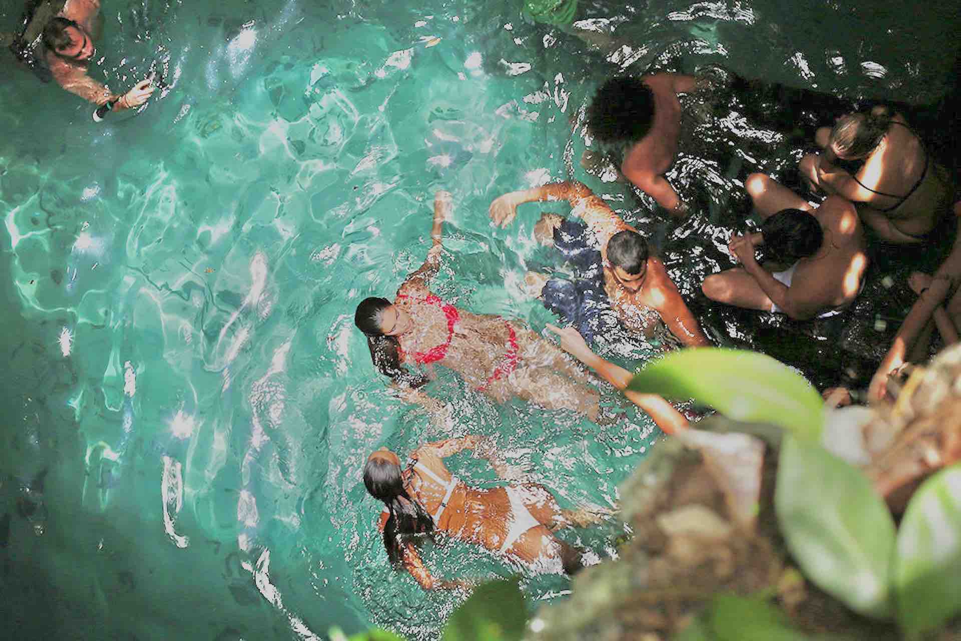 Cenote Riviera Maya snorkel tour guests floating