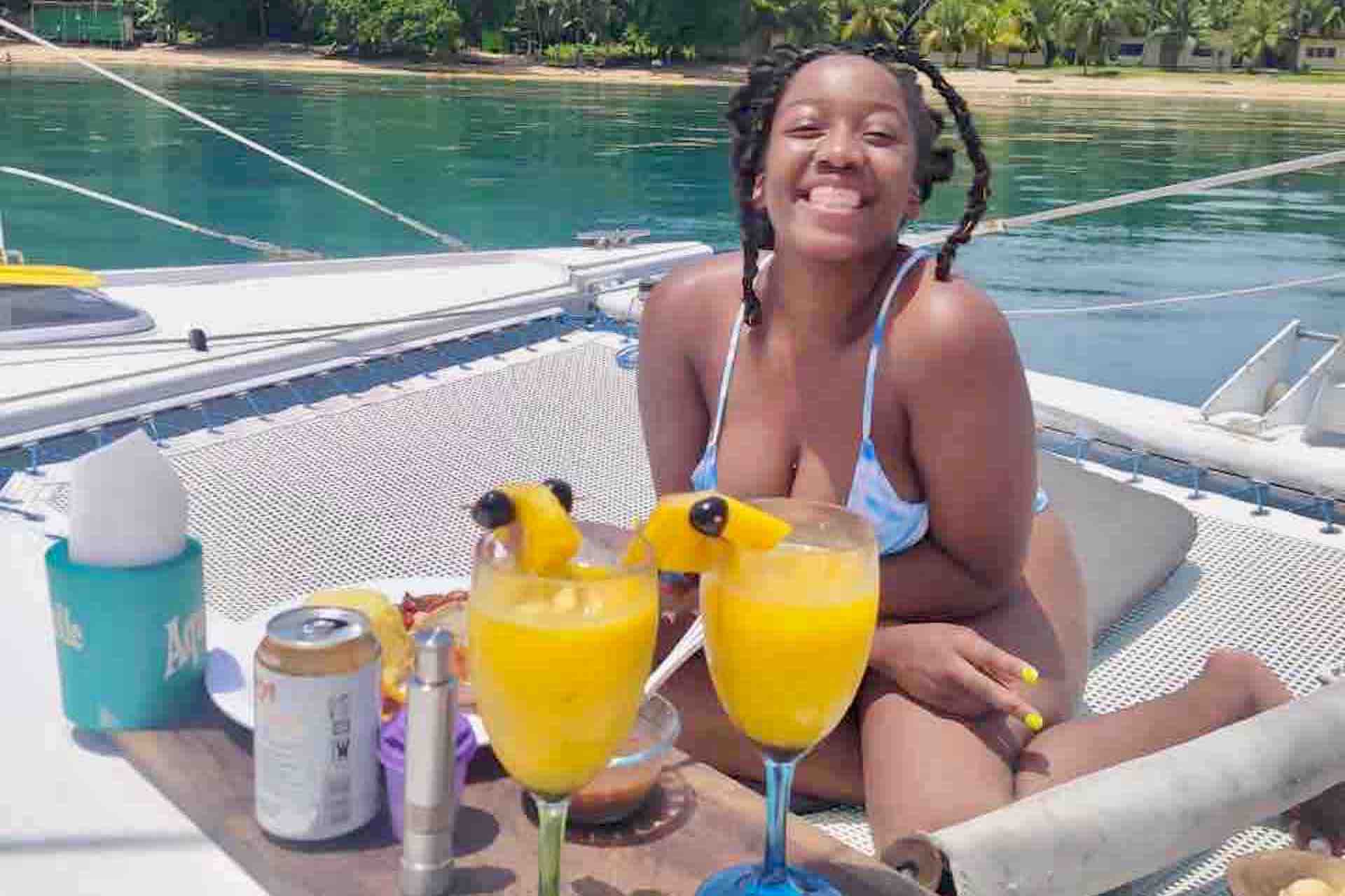 Panama Caribbean tour happy guest with cocktail