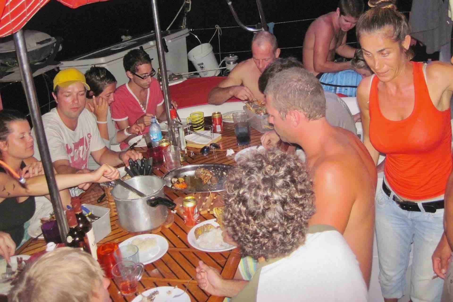 Taboga island tour Panama private sailboat tour guests at dinner table