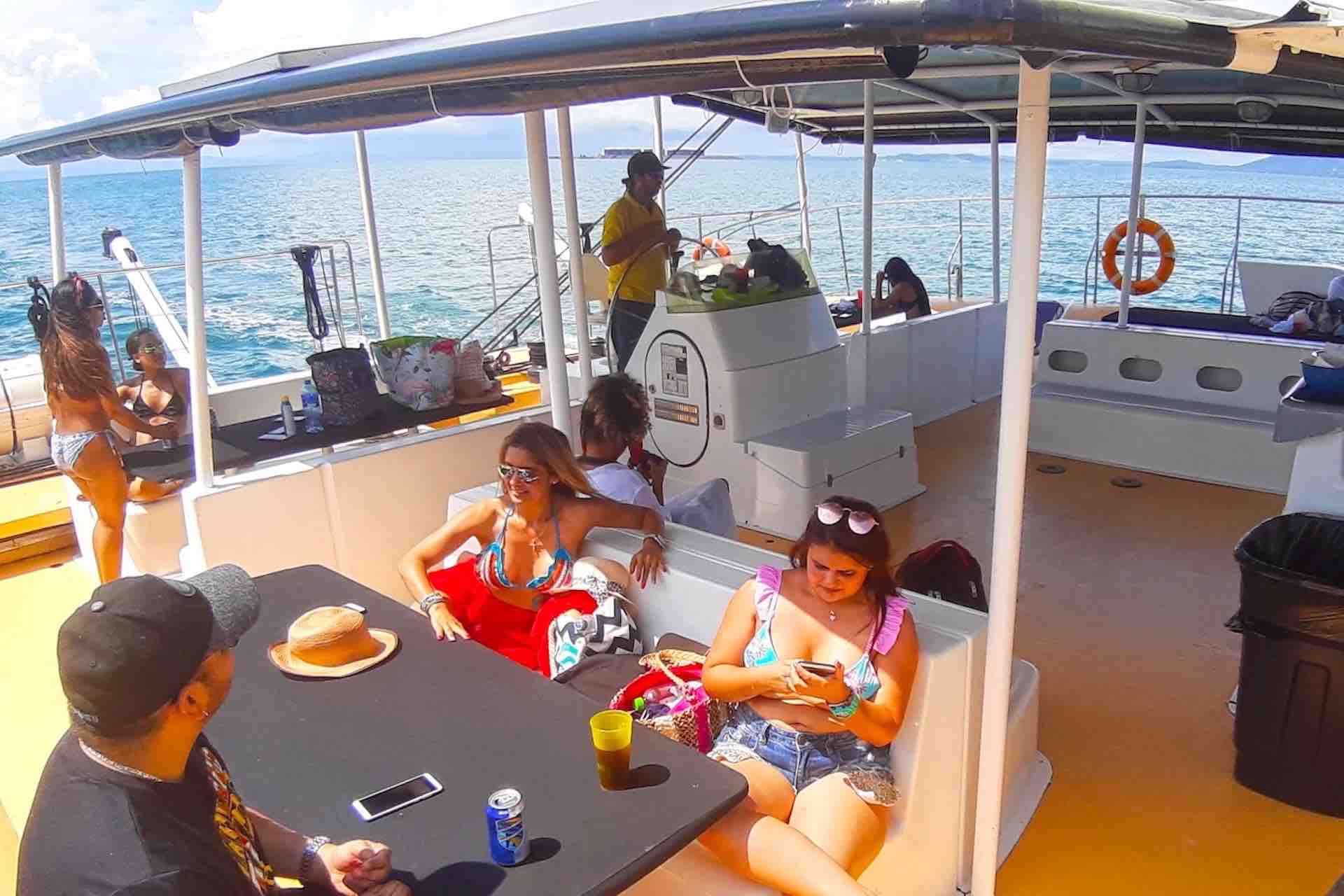 Manga Taboga island sailboat charter guests in cockpit