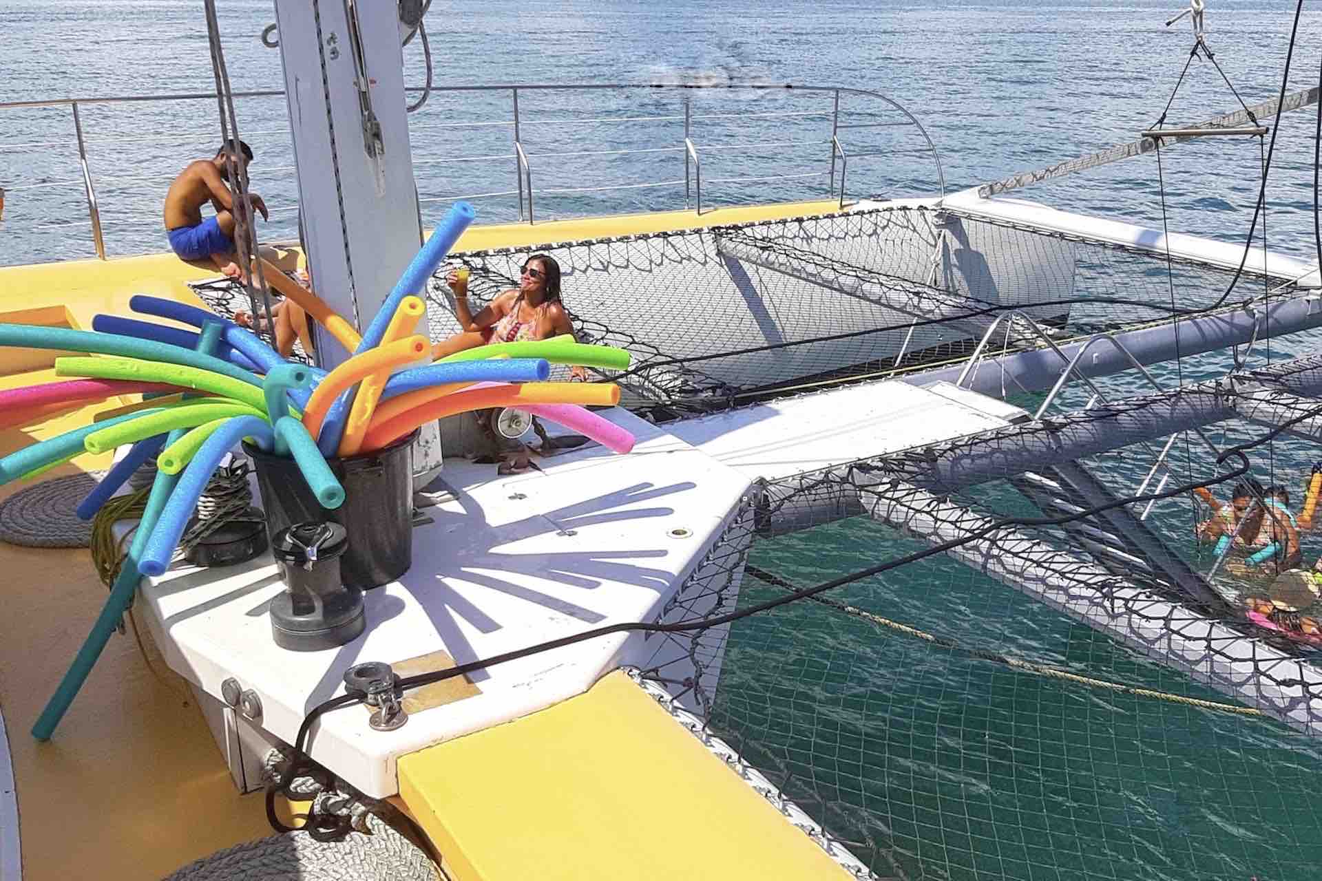 Manga Taboga island sailboat charter guests net hammock swimming noodles