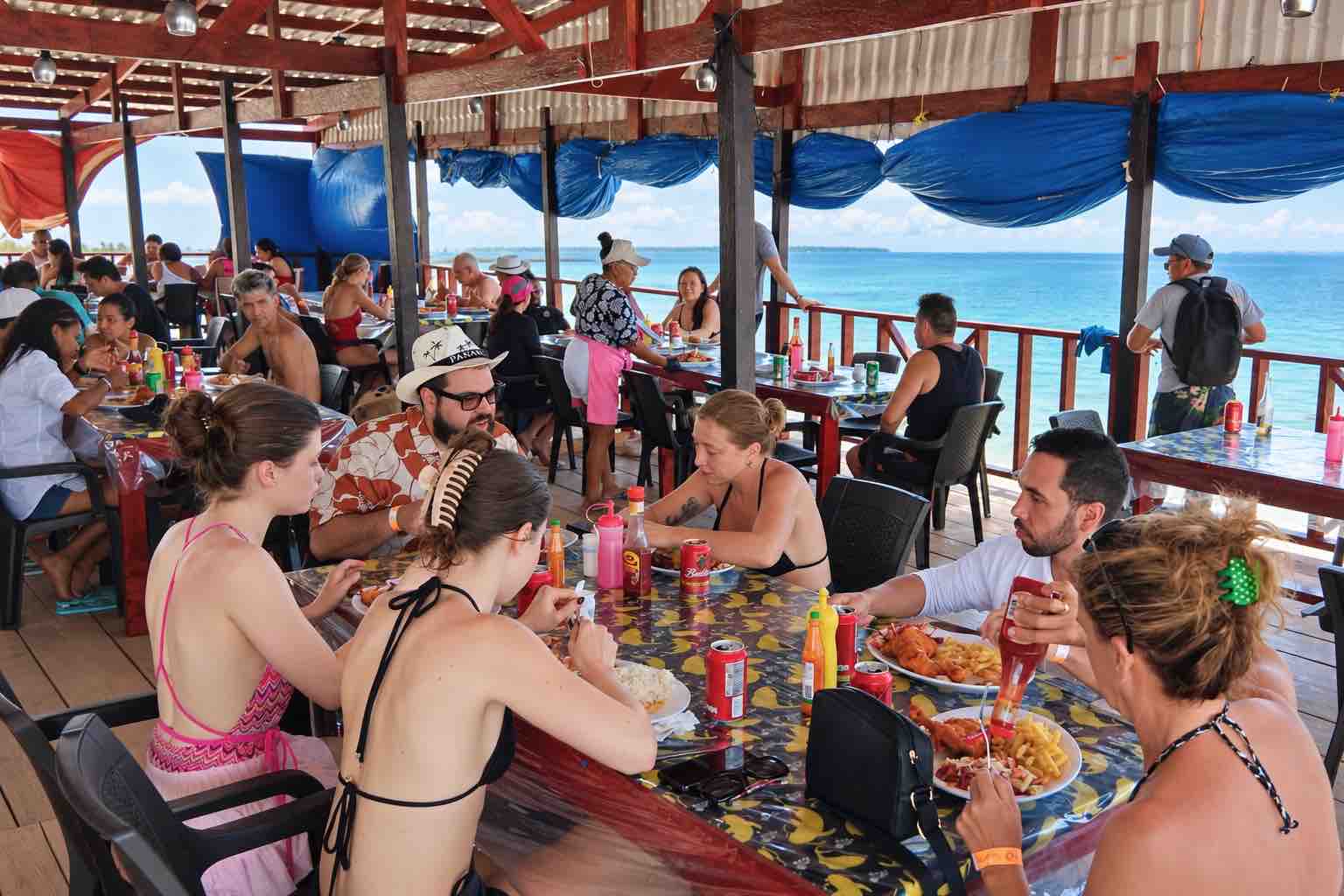 Guests eating at the island restaurant on Isla Perro