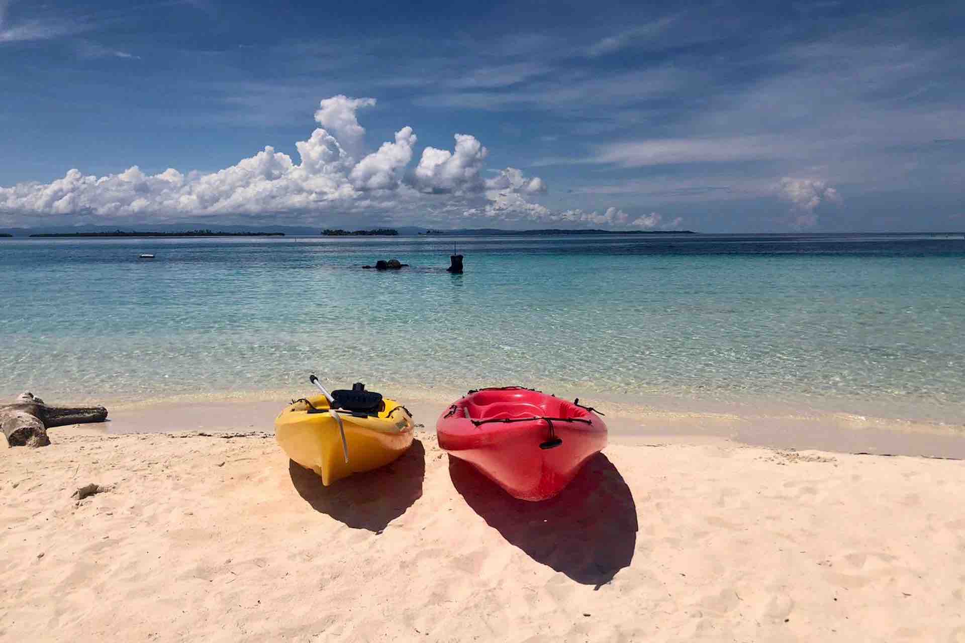 Kayaks on isla perro san blas complimentary red and yellow