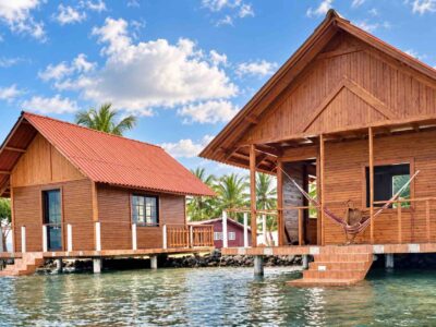 Two wooden oceanfront cabins on Isla Guasirdup in the San Blas Islands
