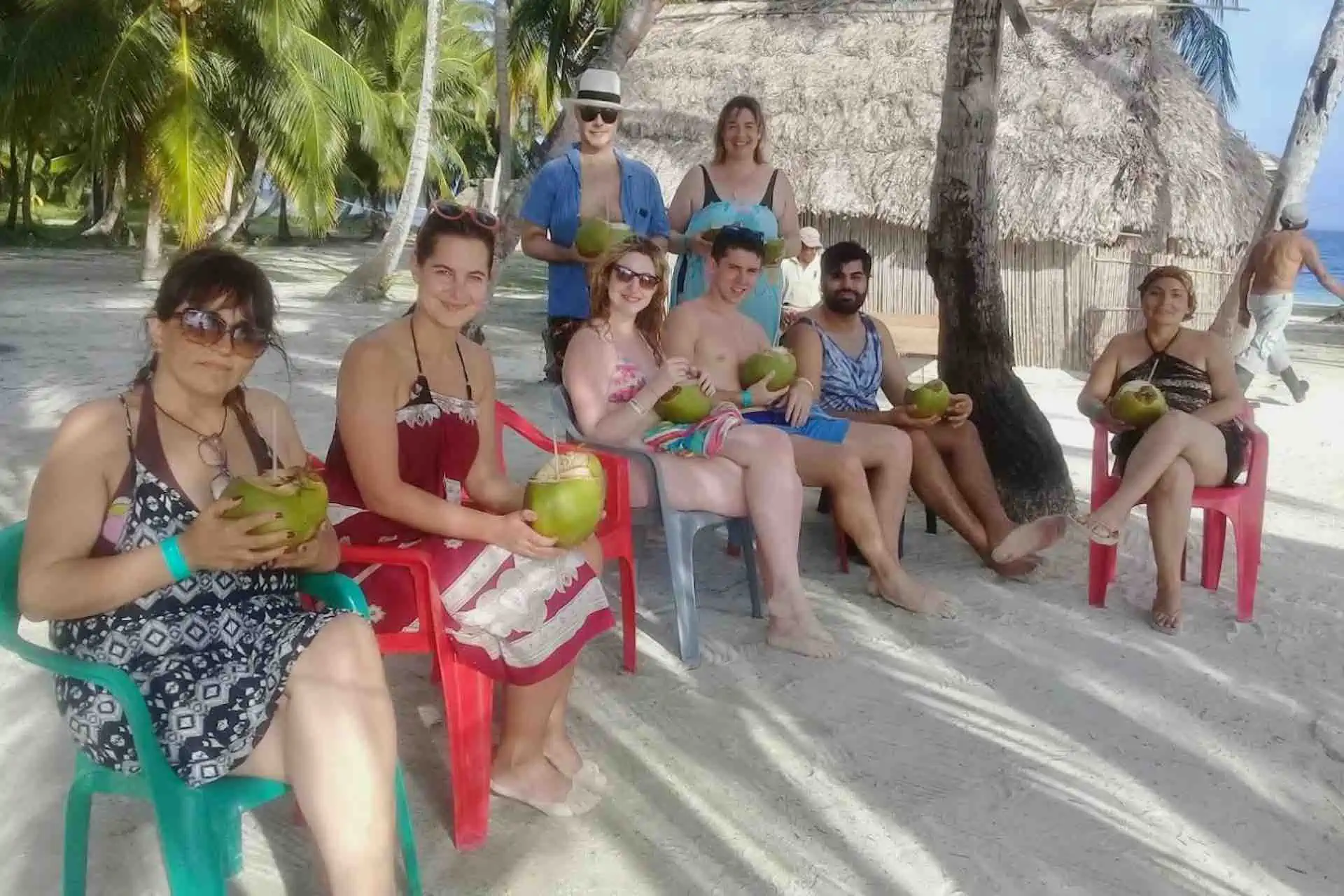 Isla Eneida San Blas guests holding coconuts