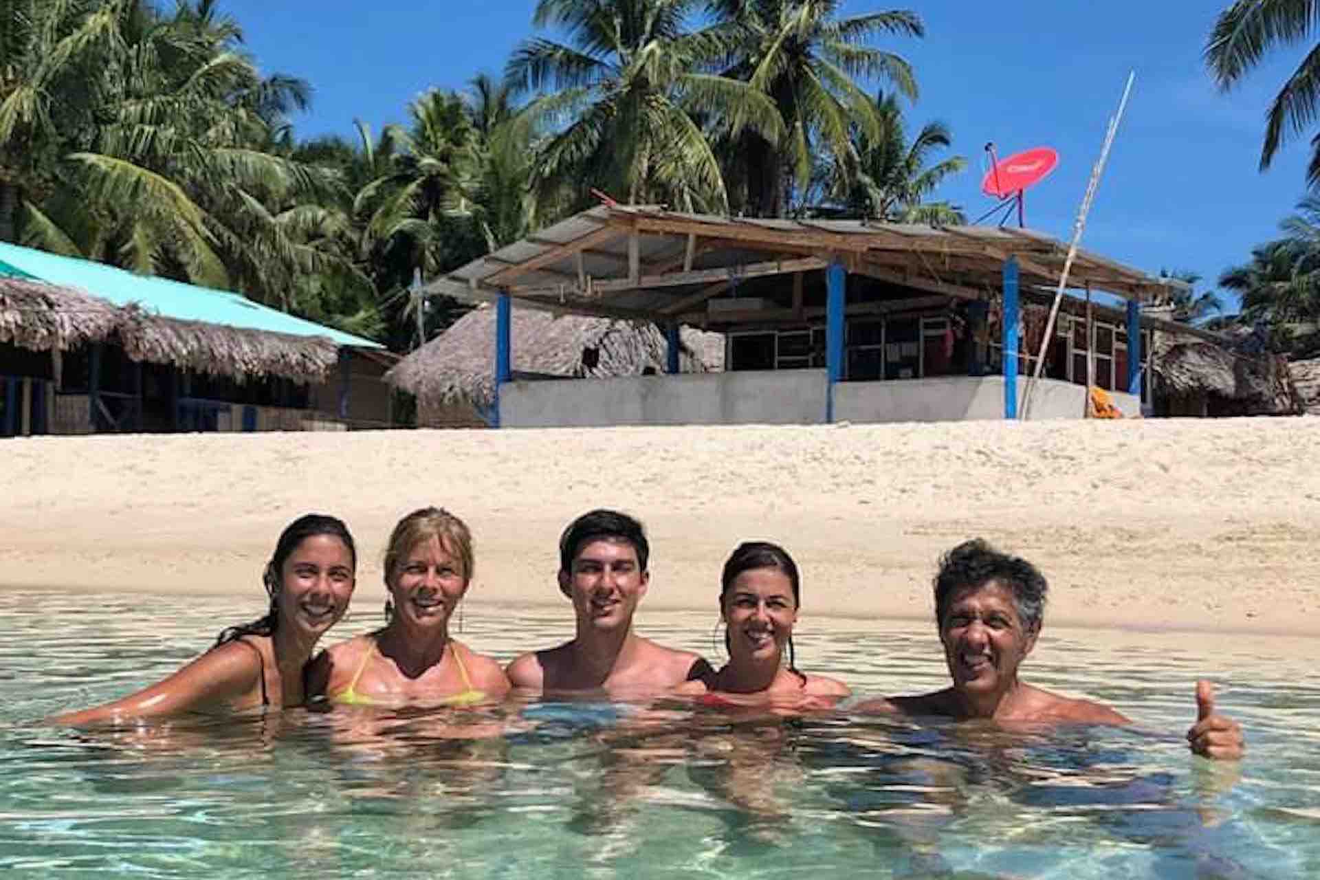 Isla Eneida San Blas guests sitting in water