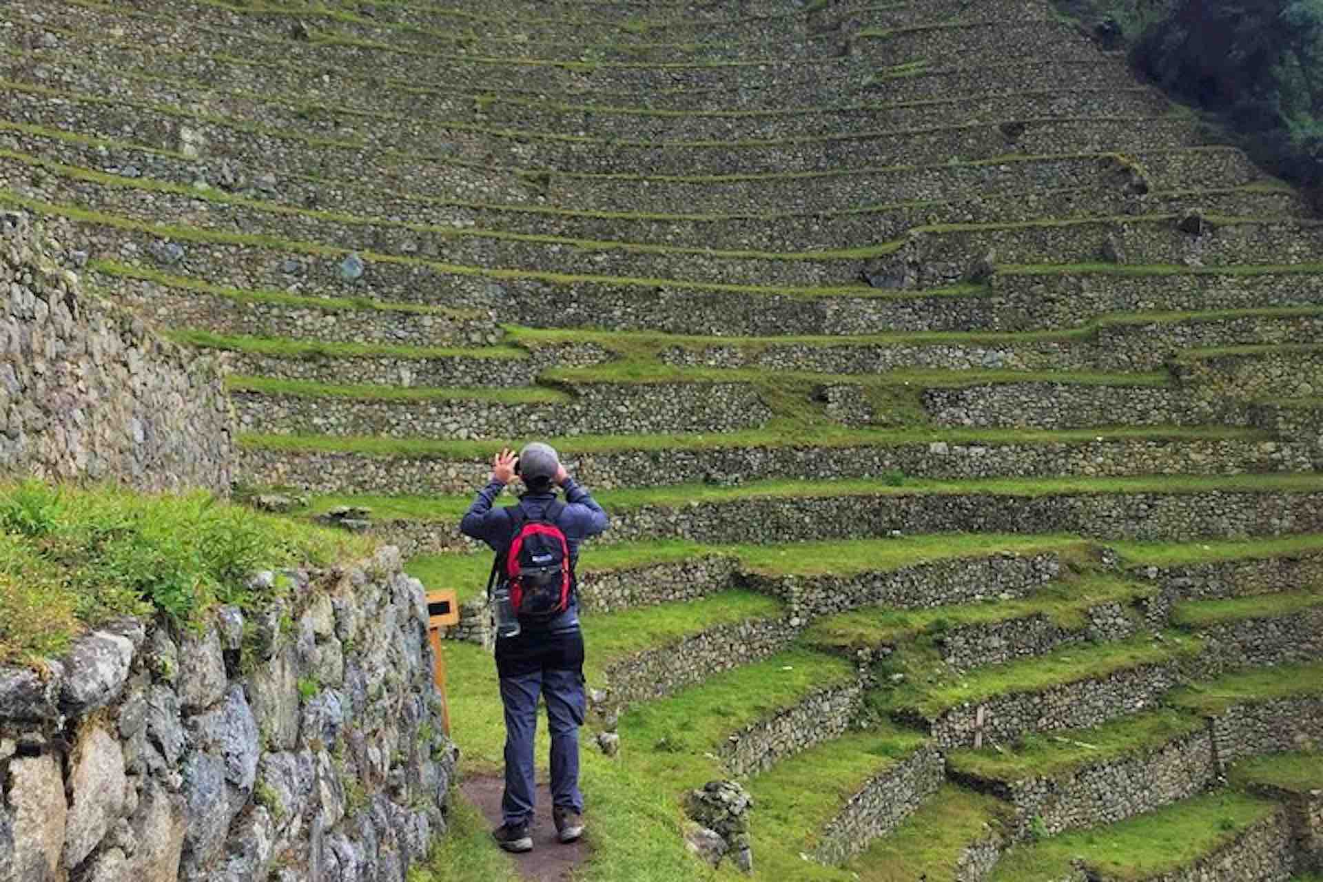 Machu Picchu man taking photo