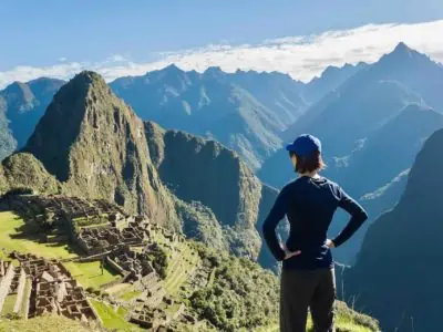 Machu Picchu woman looking into distance