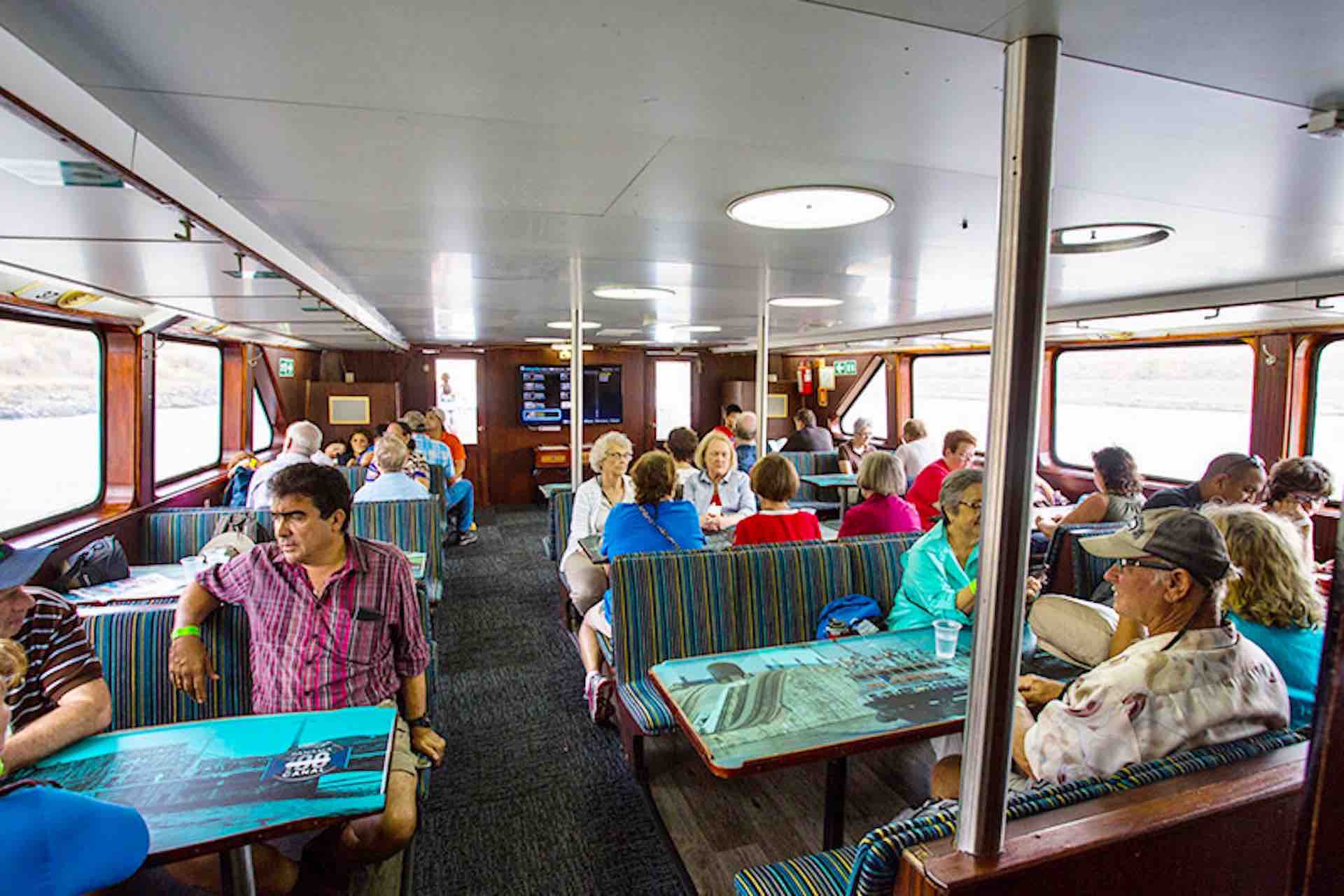 Pacific Queen Panama Canal boat interior with guests