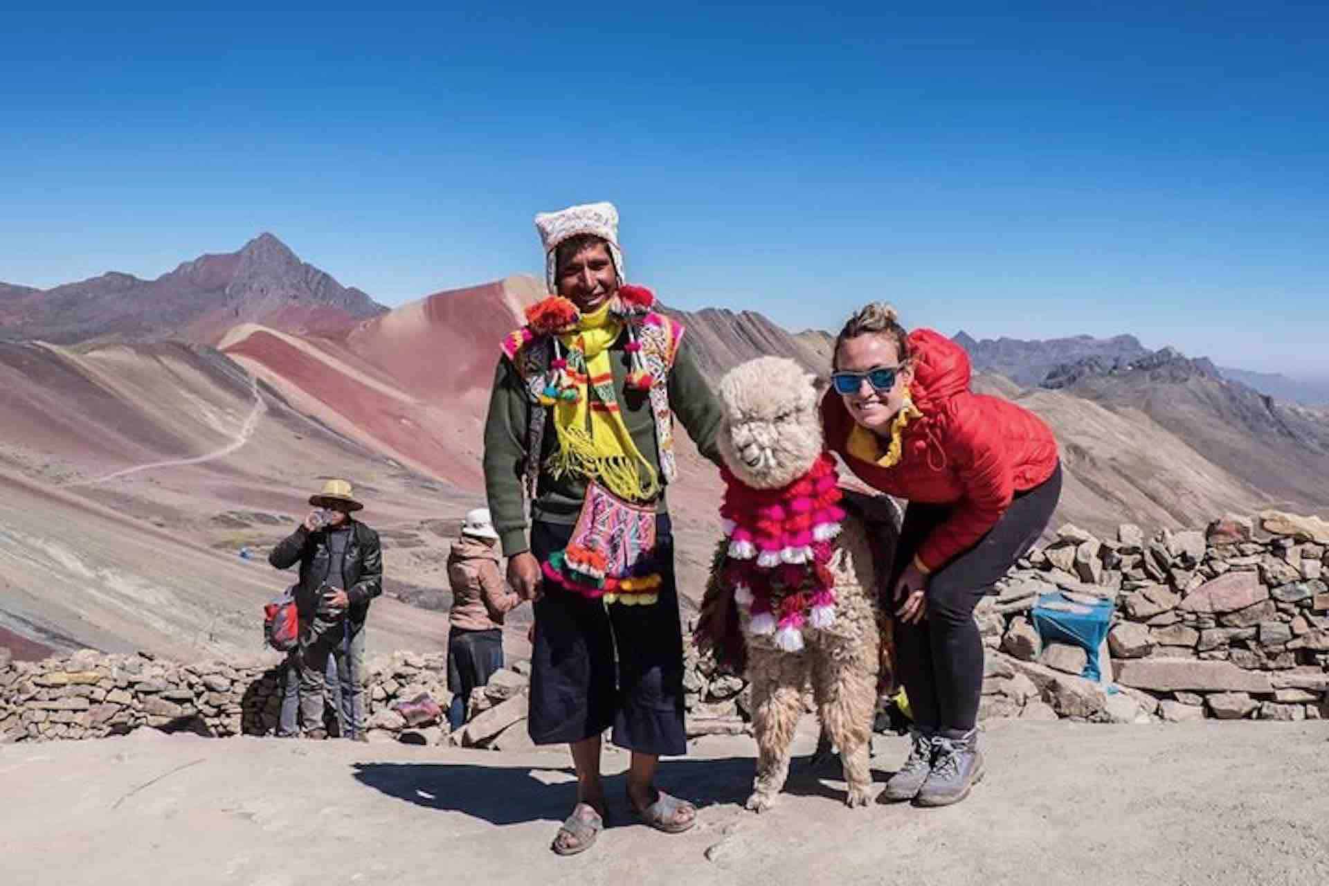 Rainbow Mountain woman with llama