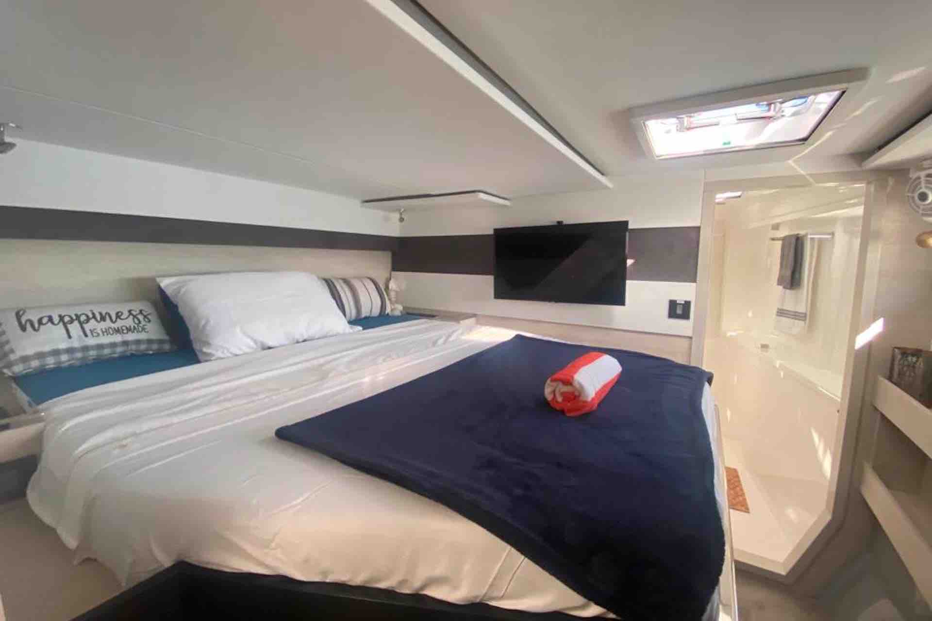 San Blas Charter catamaran bedroom with king bed