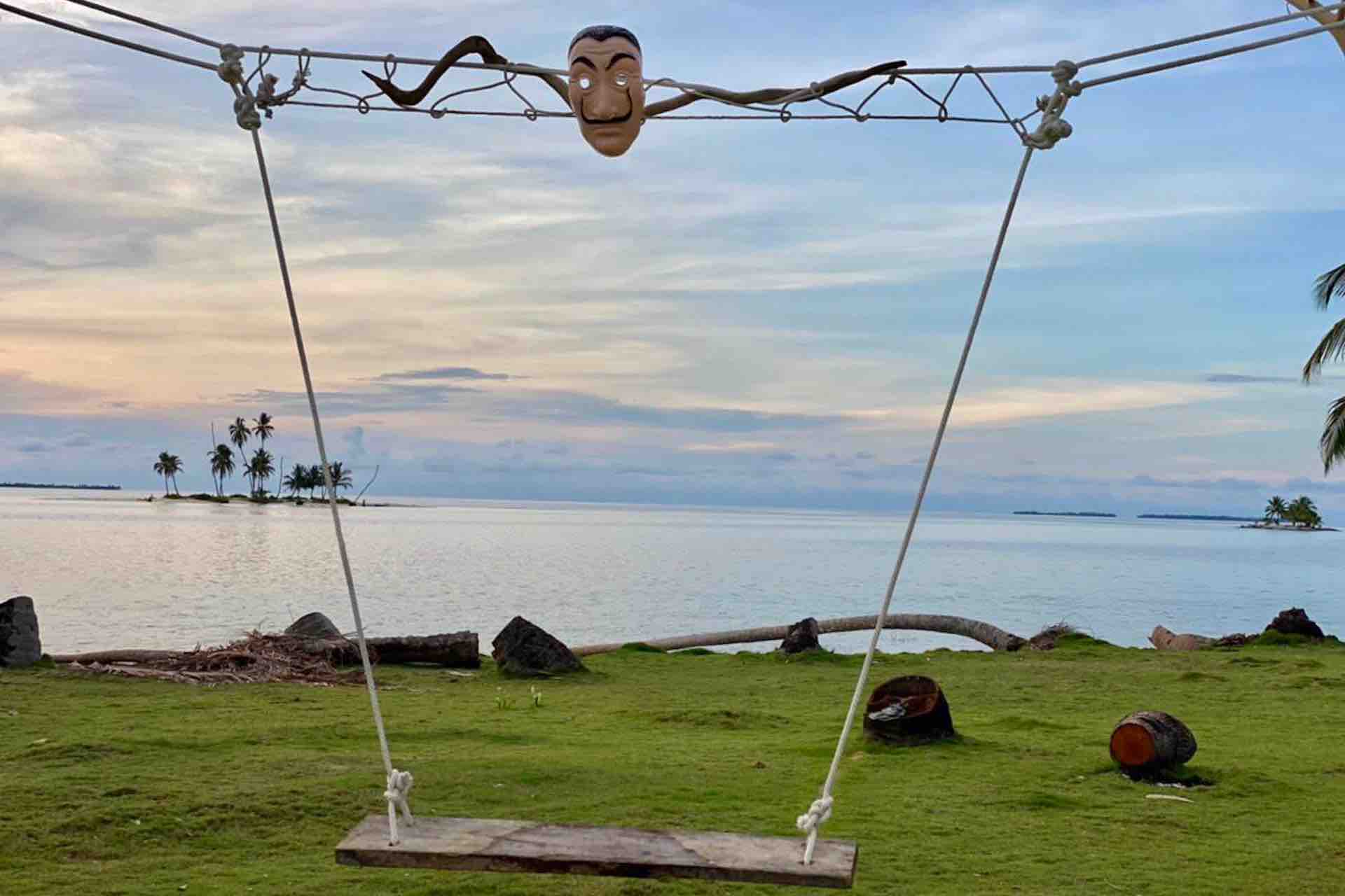 Isla Pelicano San Blas casa de papel swing during sunset