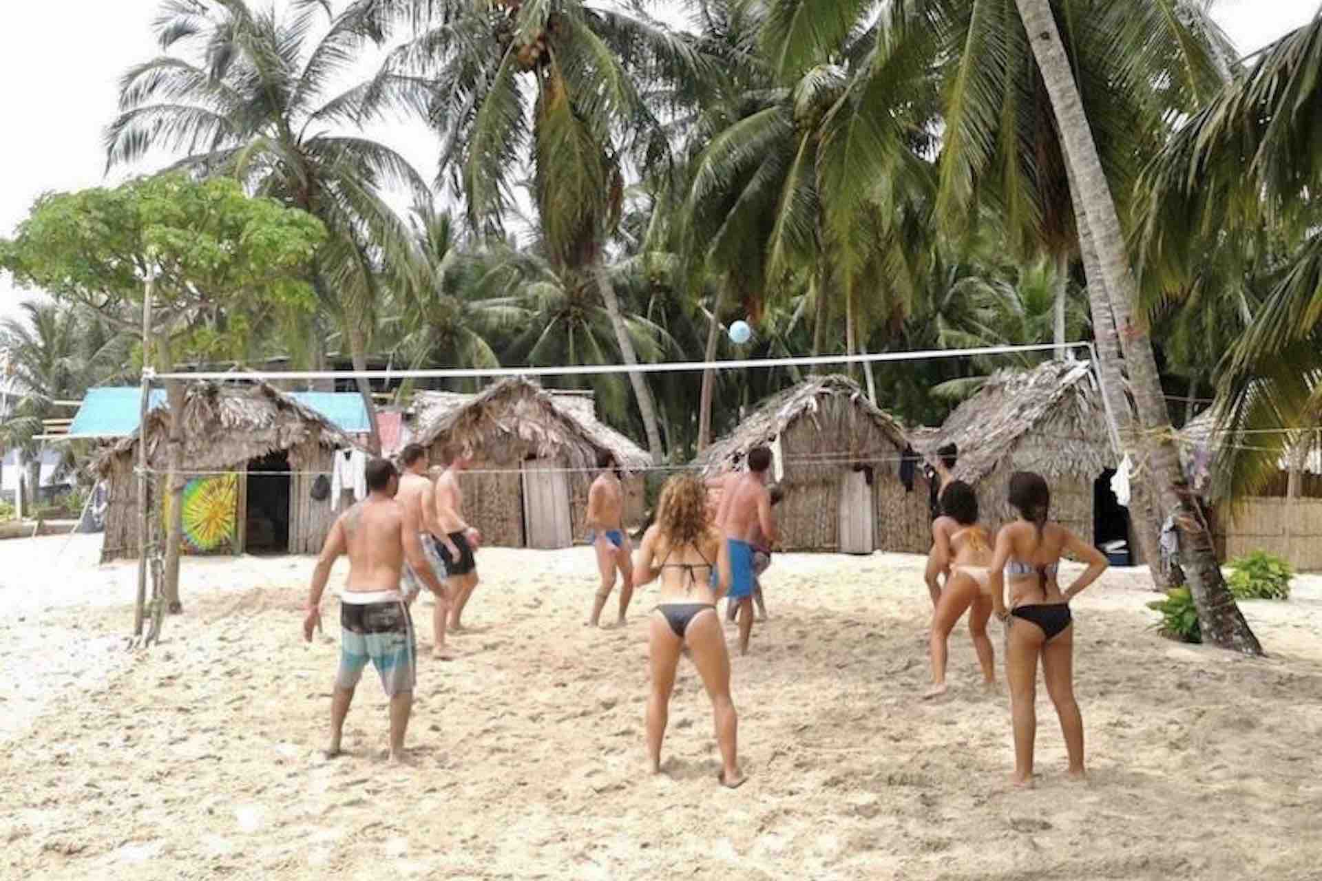 San Blas Isla Ina island guests toursists play beach volleyball