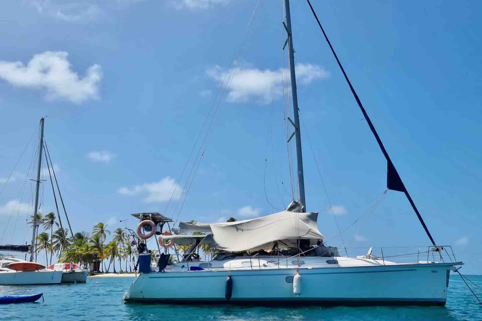 San Blas sailing charter sailboat anchored at island