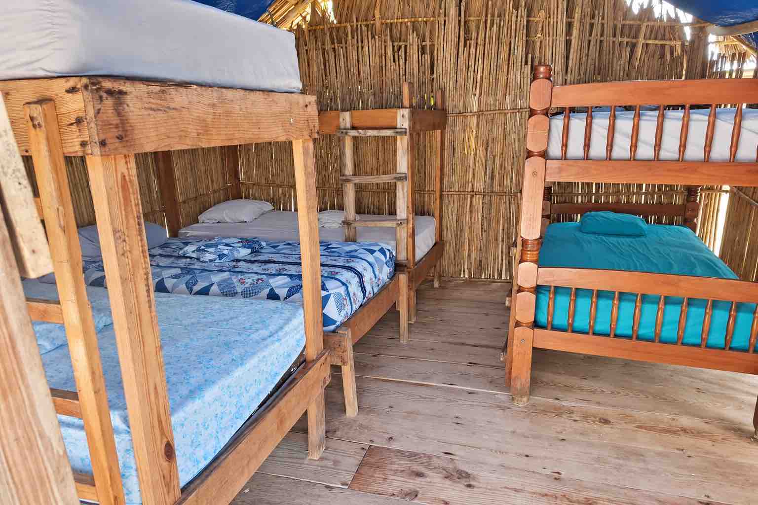 Shared Cabin Bunk Beds on Isla Ina Wooden bunk beds inside an Isla Ina San Blas shared cabin