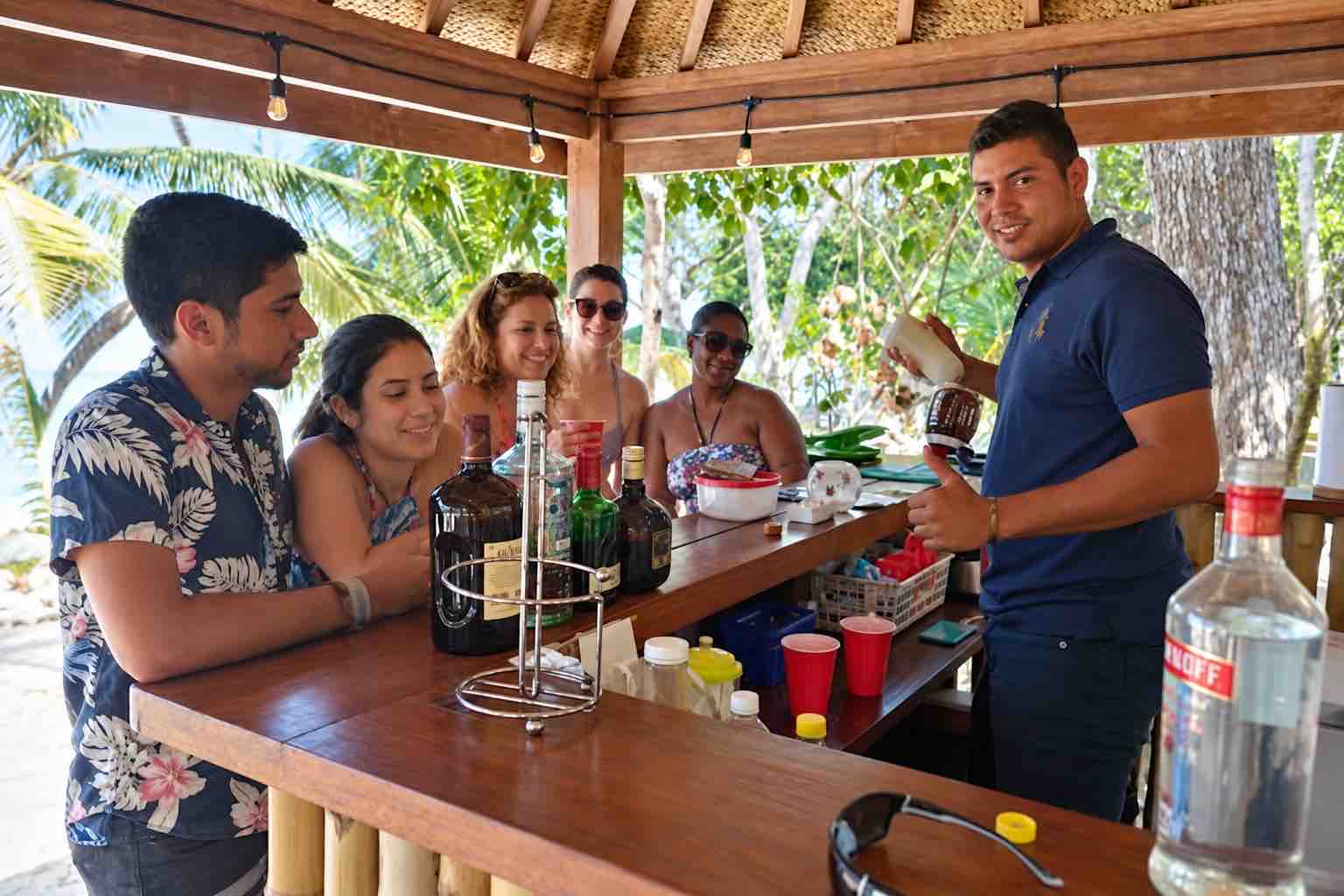 Guests gathered at the beach bar during a Pearl Islands Panama Day Trip