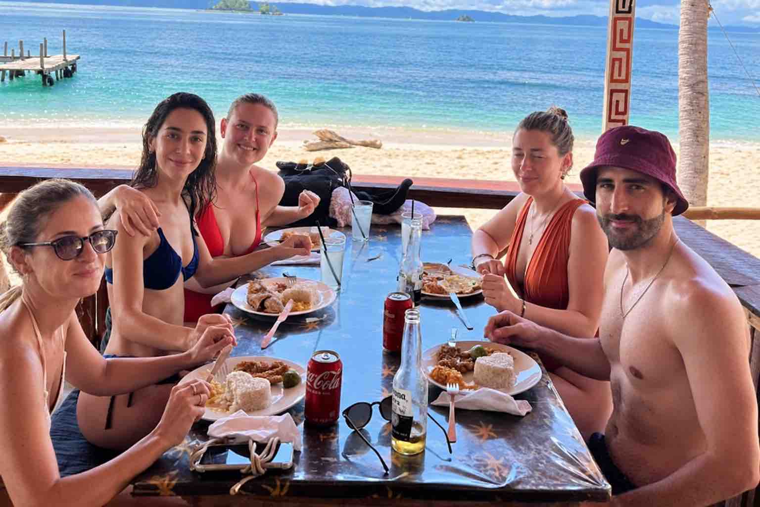 Guests enjoying lunch with a sea view on Isla Guasirdup