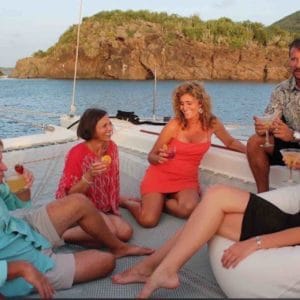 San Blas Sailing charter catamaran guests with cocktails